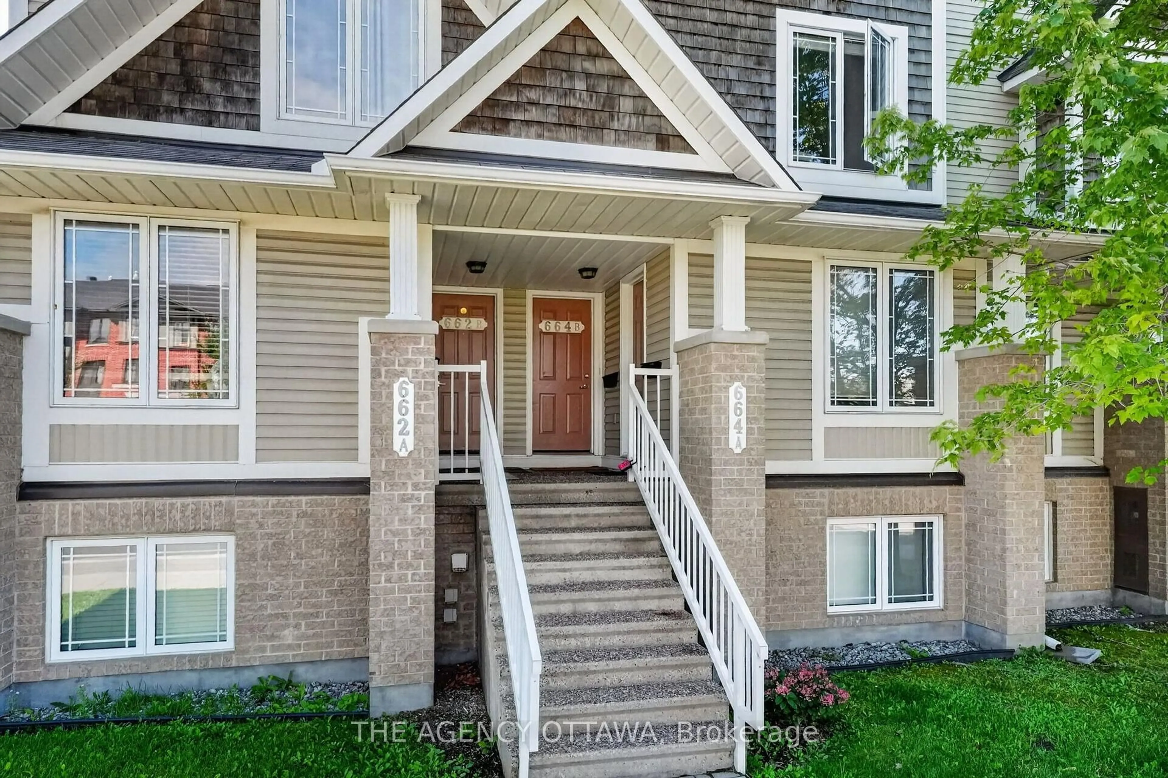 Home with brick exterior material, street for 664 Chapman Mills Dr #B, Ottawa Ontario K2J 3V2
