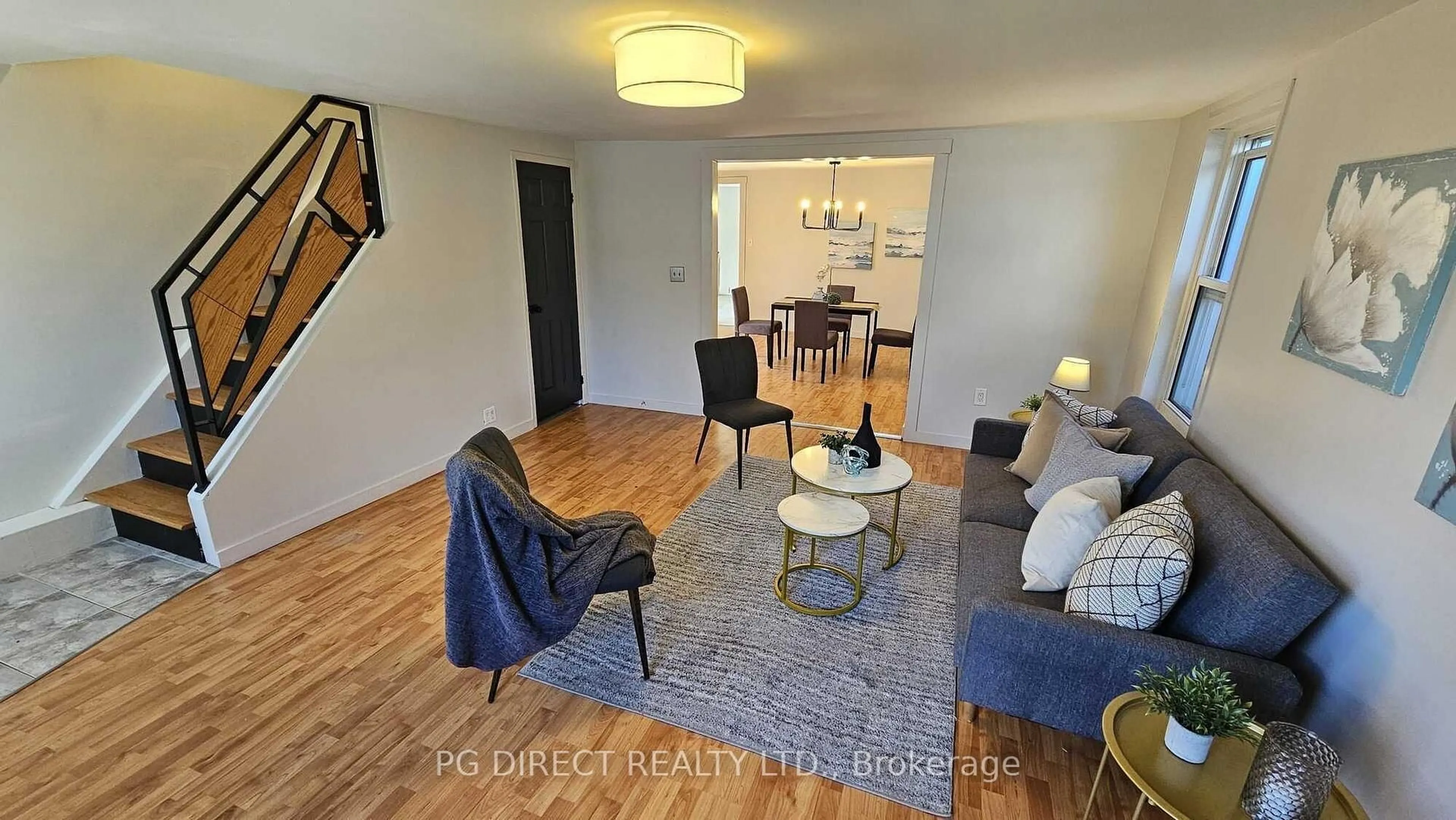 Living room with furniture, wood/laminate floor for 436 Bleecker Ave, Belleville Ontario K8N 2R6