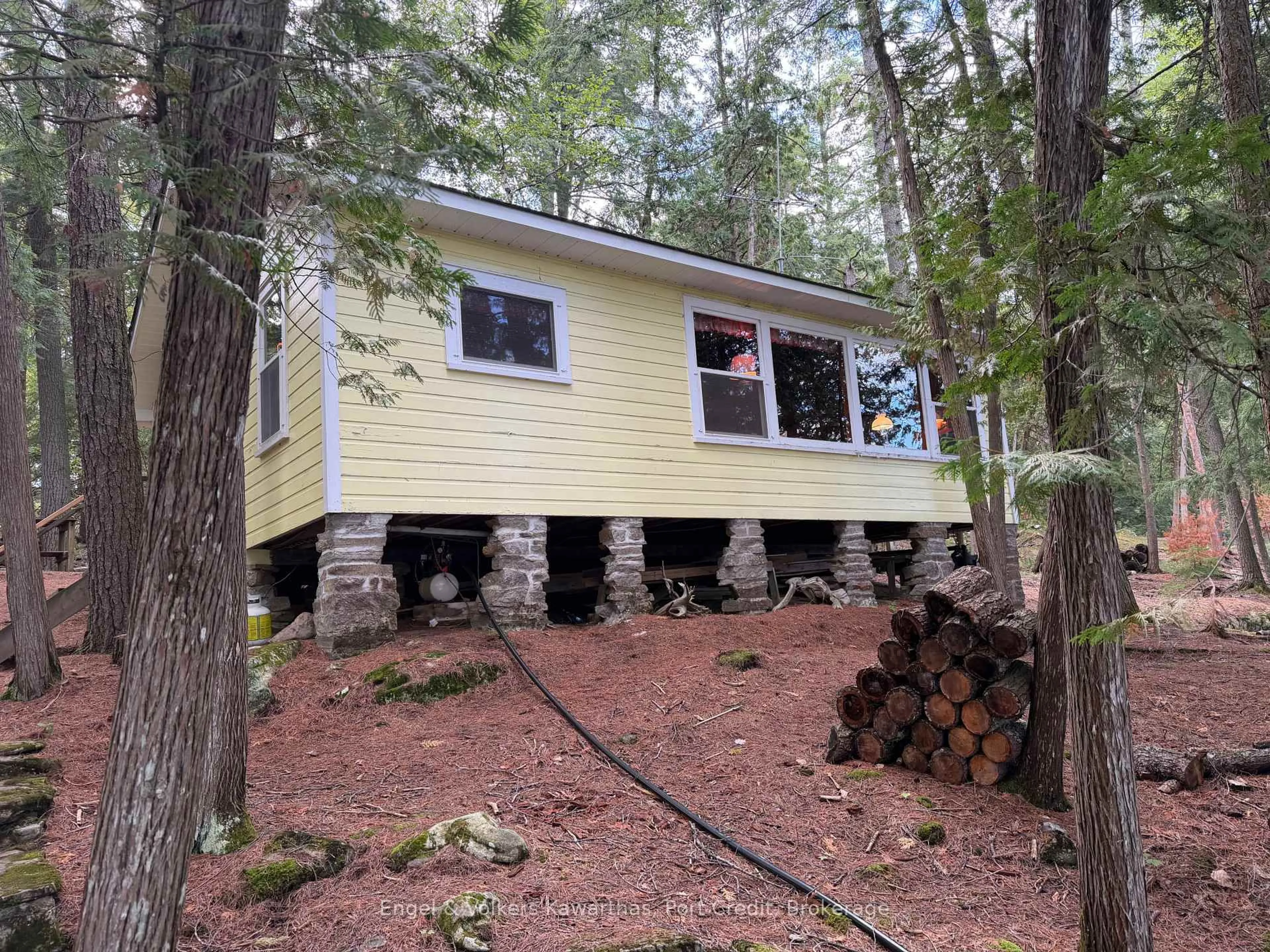 Home with vinyl exterior material, forest/trees view for 695 Griggs Island Jack Lake WAO Island, Havelock-Belmont-Methuen Ontario K0L 1A0