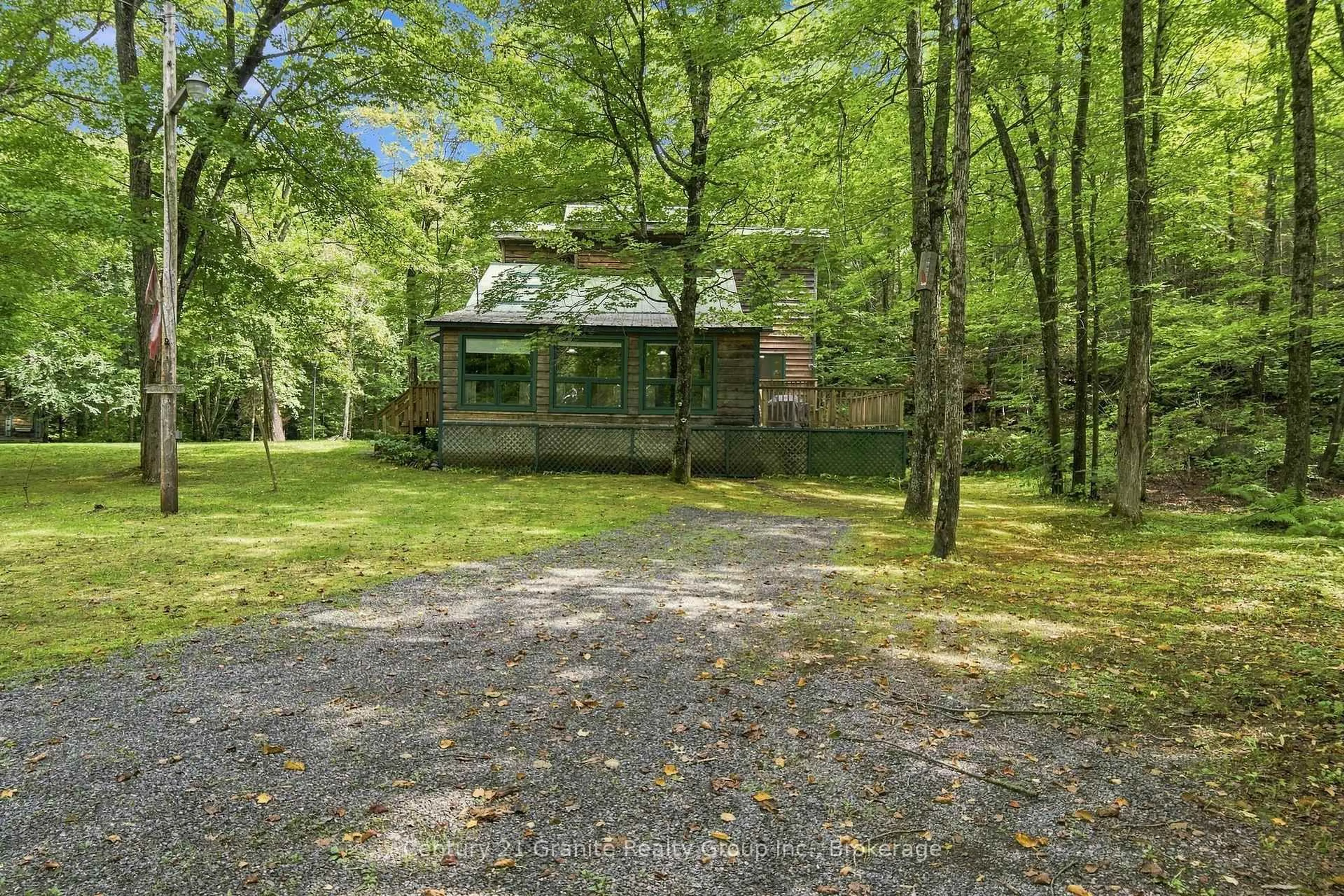 A pic from outside/outdoor area/front of a property/back of a property/a pic from drone, unknown for 1131 Kanawa Lane, Algonquin Highlands Ontario K0M 1S0