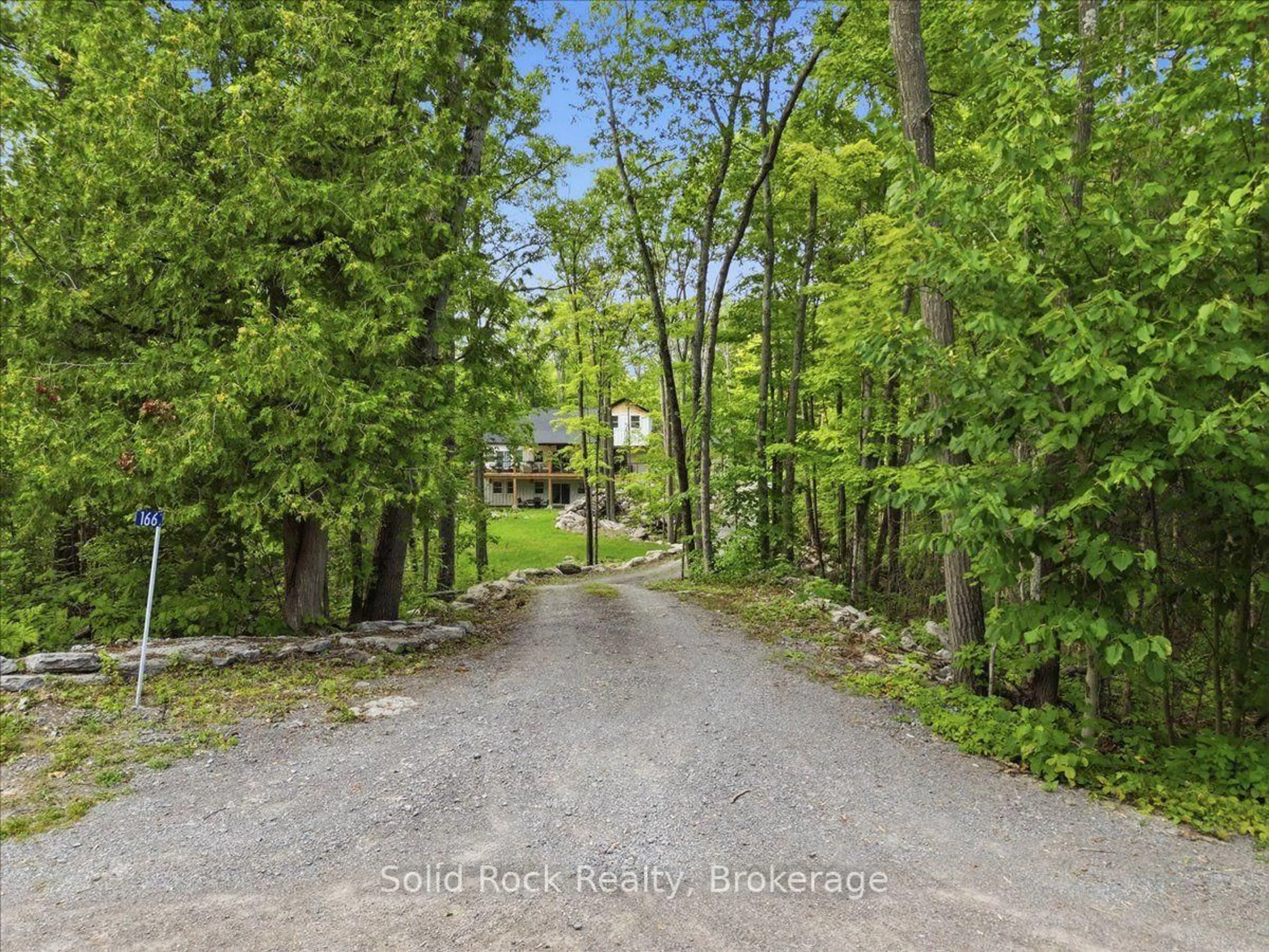 A pic from outside/outdoor area/front of a property/back of a property/a pic from drone, forest/trees view for 166 Maple Rd, Limoges Ontario K0K 2M0