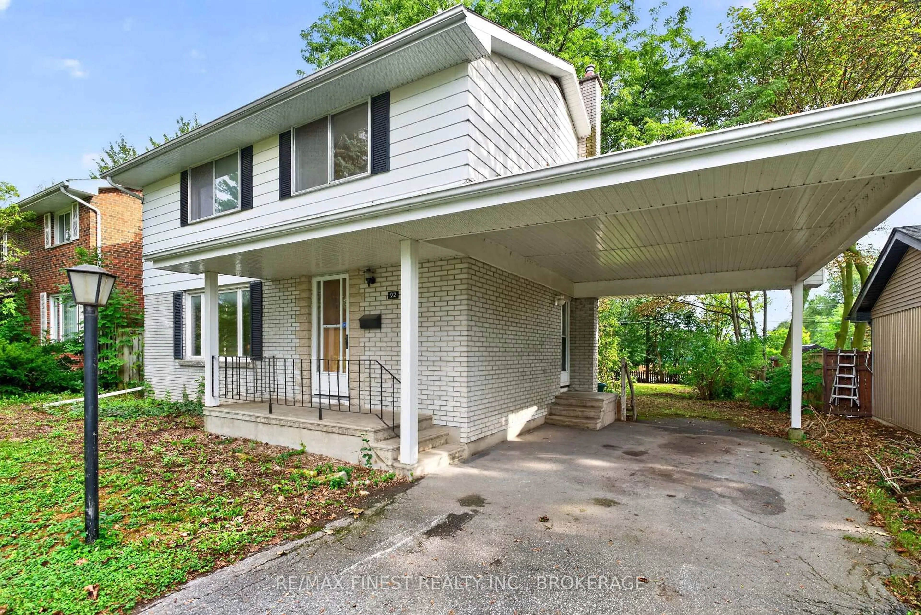 Home with vinyl exterior material, street for 92 Cliff Cres, Kingston Ontario K7M 1A8