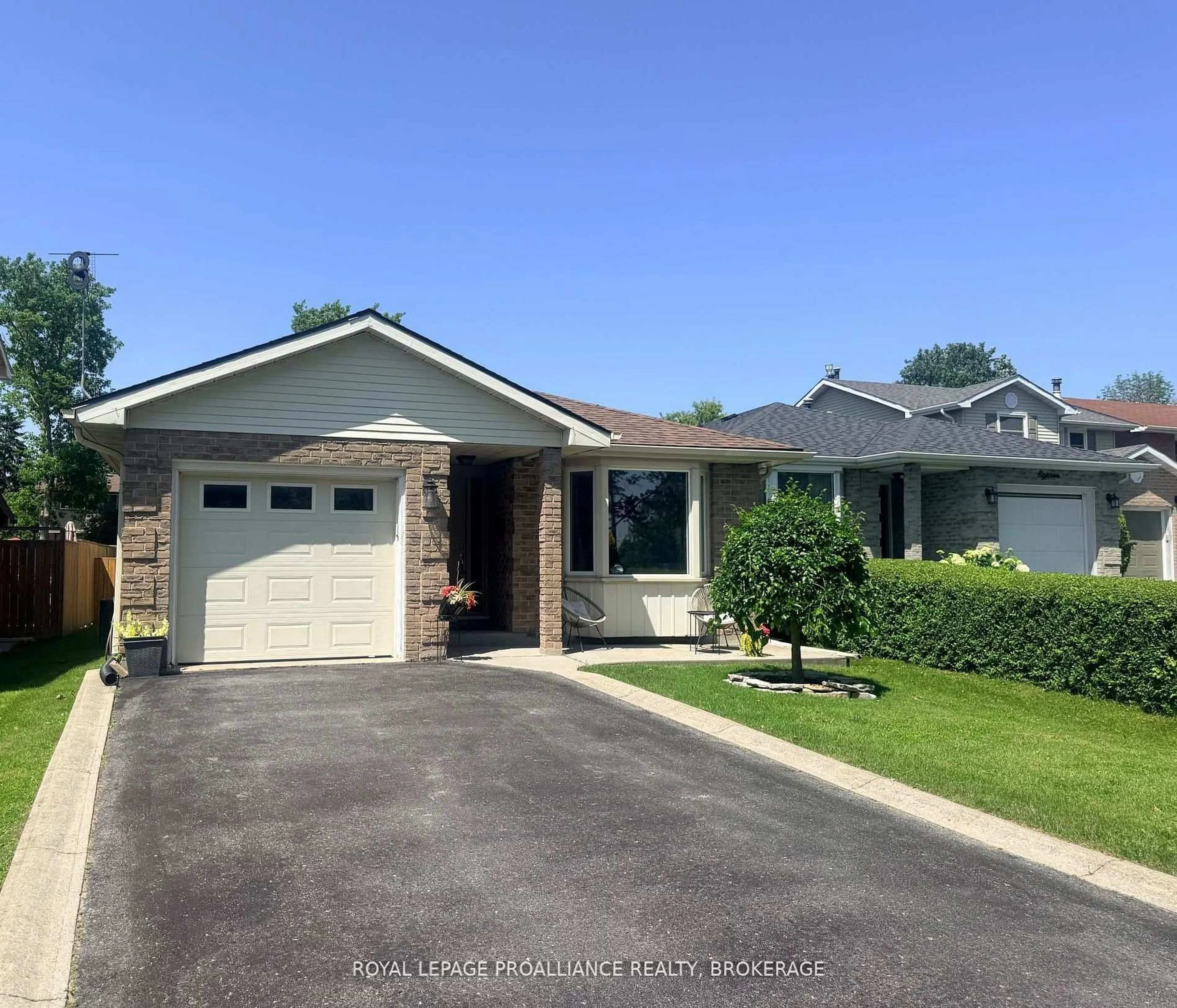 Home with vinyl exterior material, street for 16 Grenadier Dr, Kingston Ontario K7K 6E8