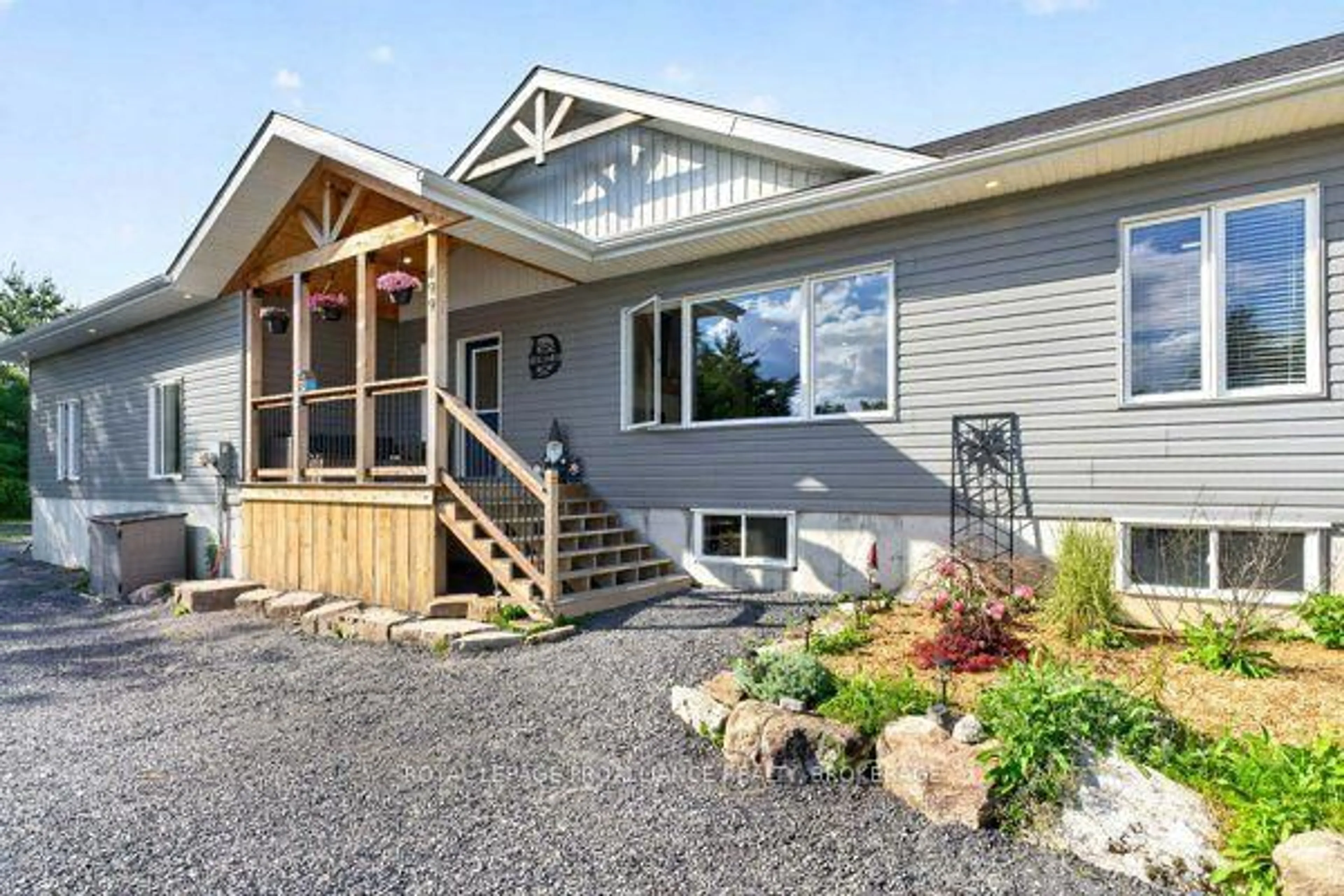 Home with vinyl exterior material, mountain view for 499 Bush Rd, Rideau Lakes Ontario K0G 1E0