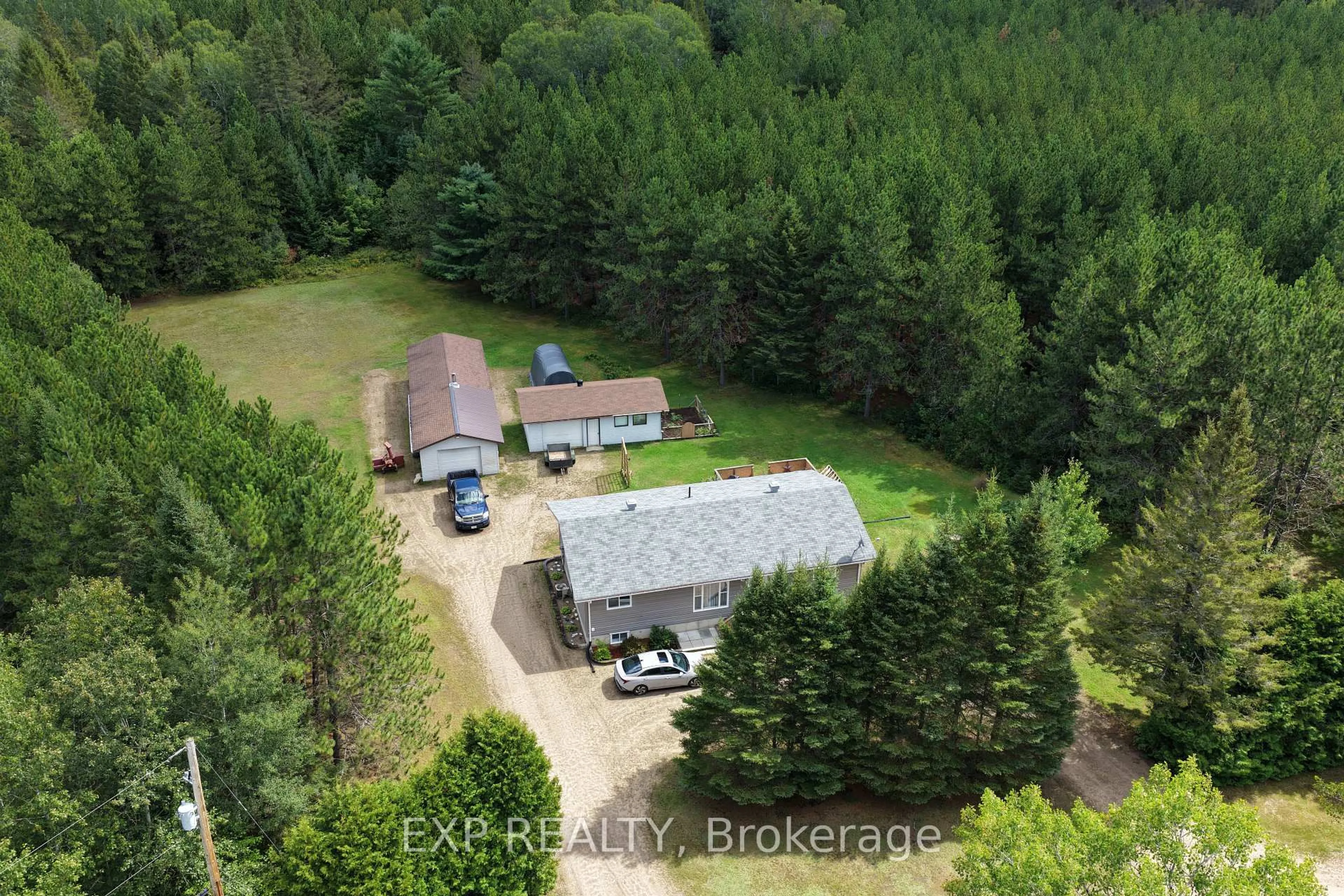 A pic from outside/outdoor area/front of a property/back of a property/a pic from drone, forest/trees view for 716 Cybulski Rd, Barry's Bay Ontario K0J 1B0