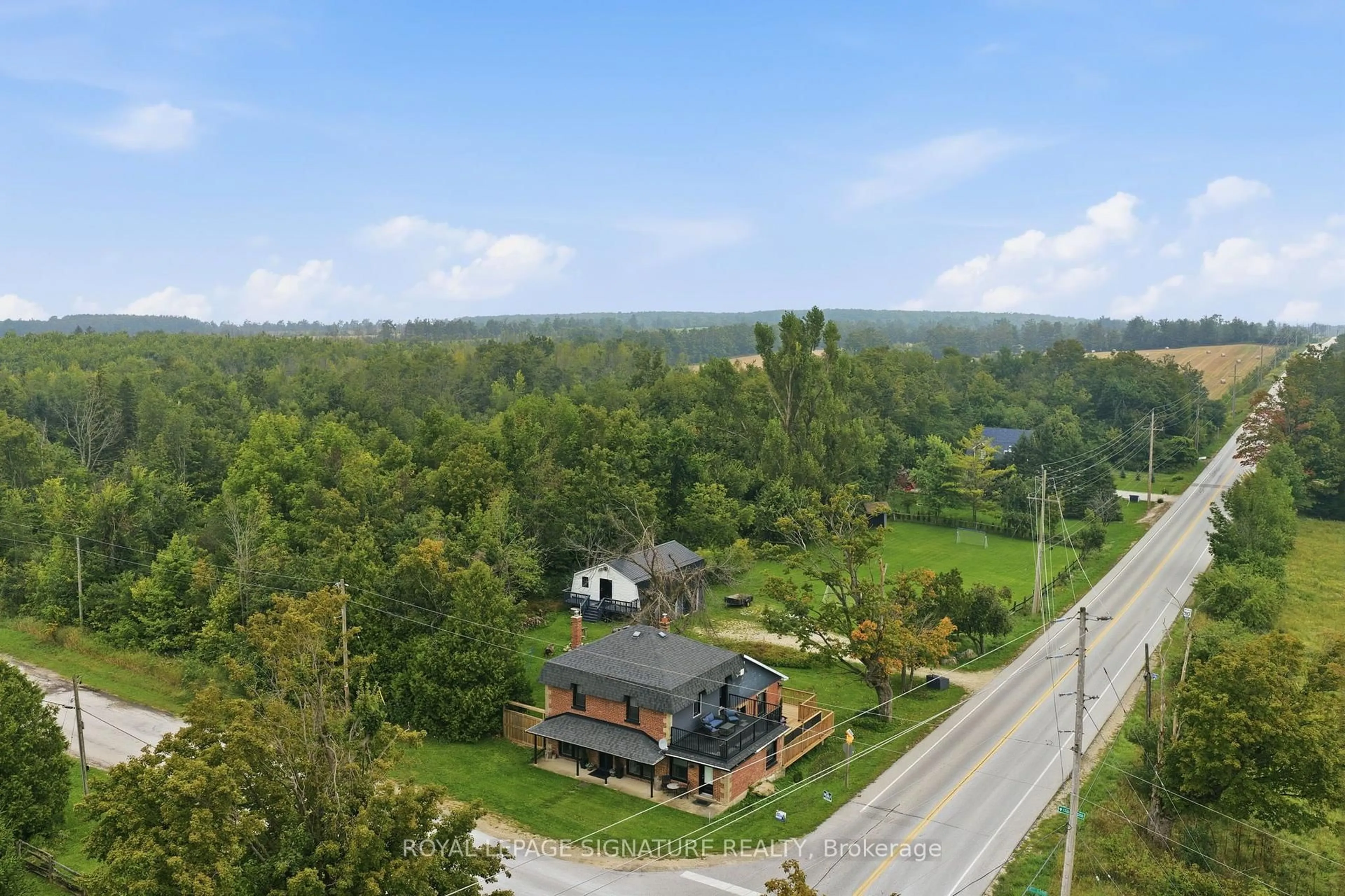A pic from outside/outdoor area/front of a property/back of a property/a pic from drone, mountain view for 629295 Grey Road 119, Blue Mountains Ontario N0H 1J0