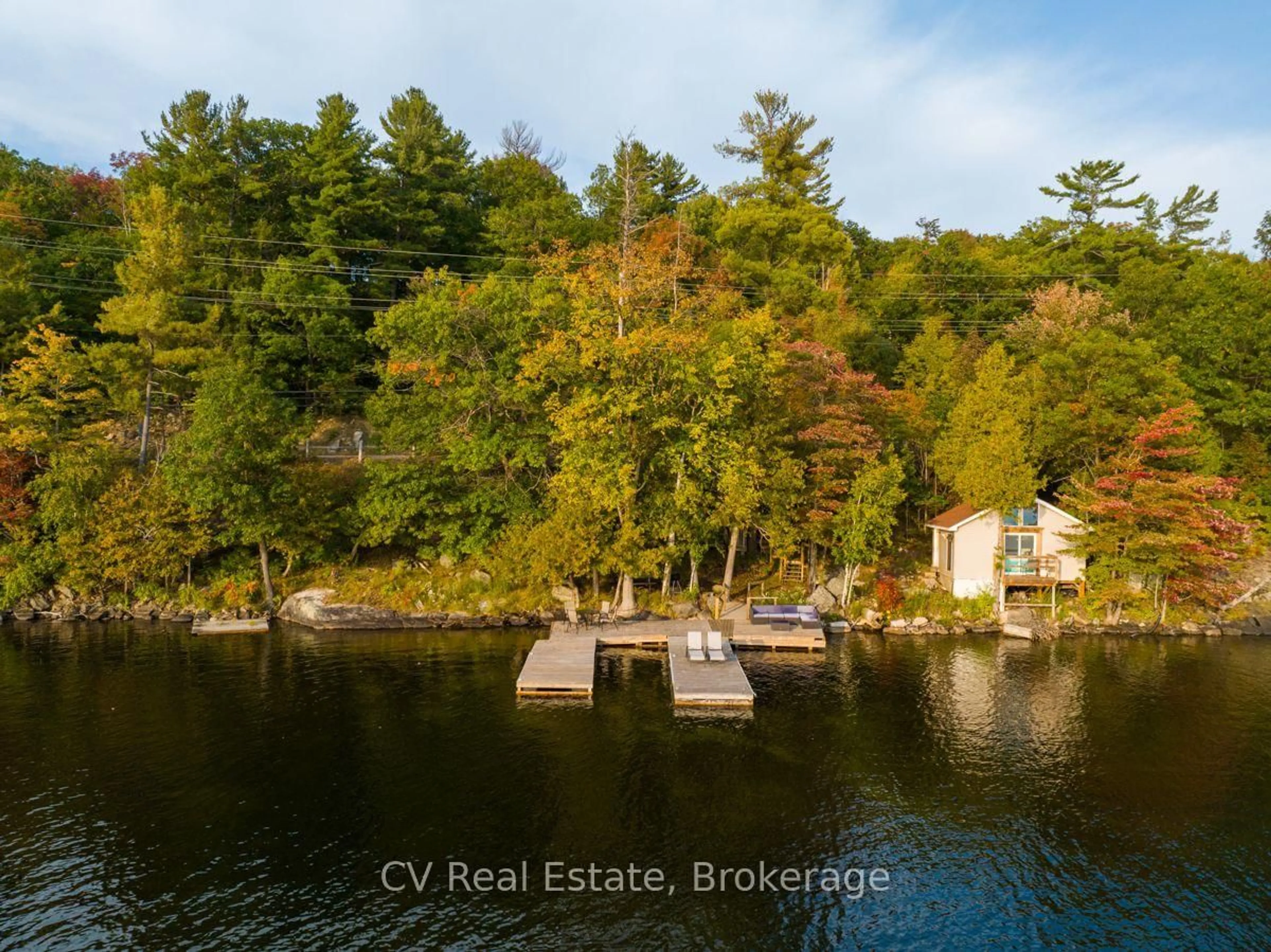 A pic from outside/outdoor area/front of a property/back of a property/a pic from drone, water/lake/river/ocean view for 1356 & 1357 Peninsula Rd, Muskoka Lakes Ontario P0B 1J0