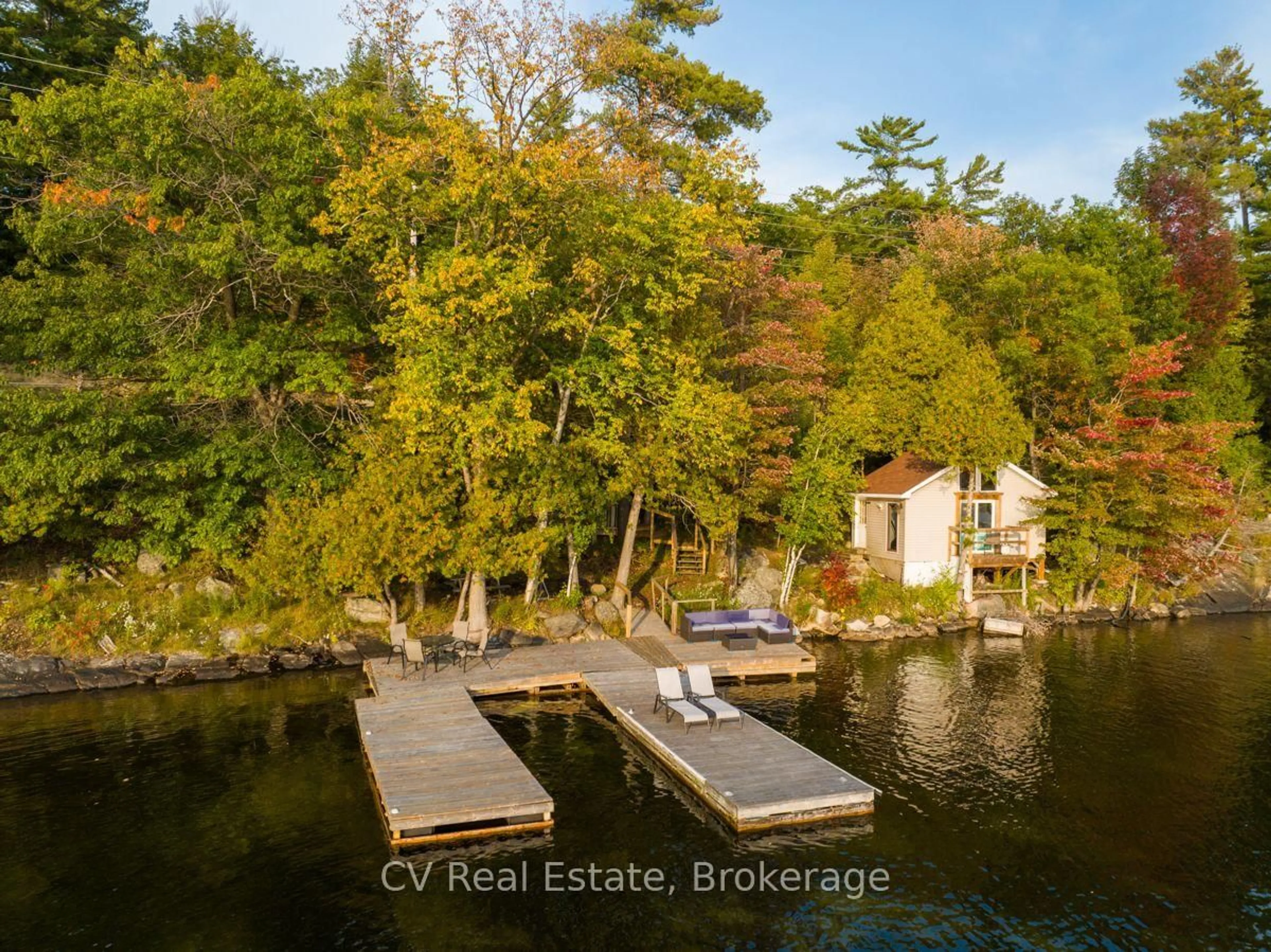 A pic from outside/outdoor area/front of a property/back of a property/a pic from drone, water/lake/river/ocean view for 1356 & 1357 Peninsula Rd, Muskoka Lakes Ontario P0B 1J0