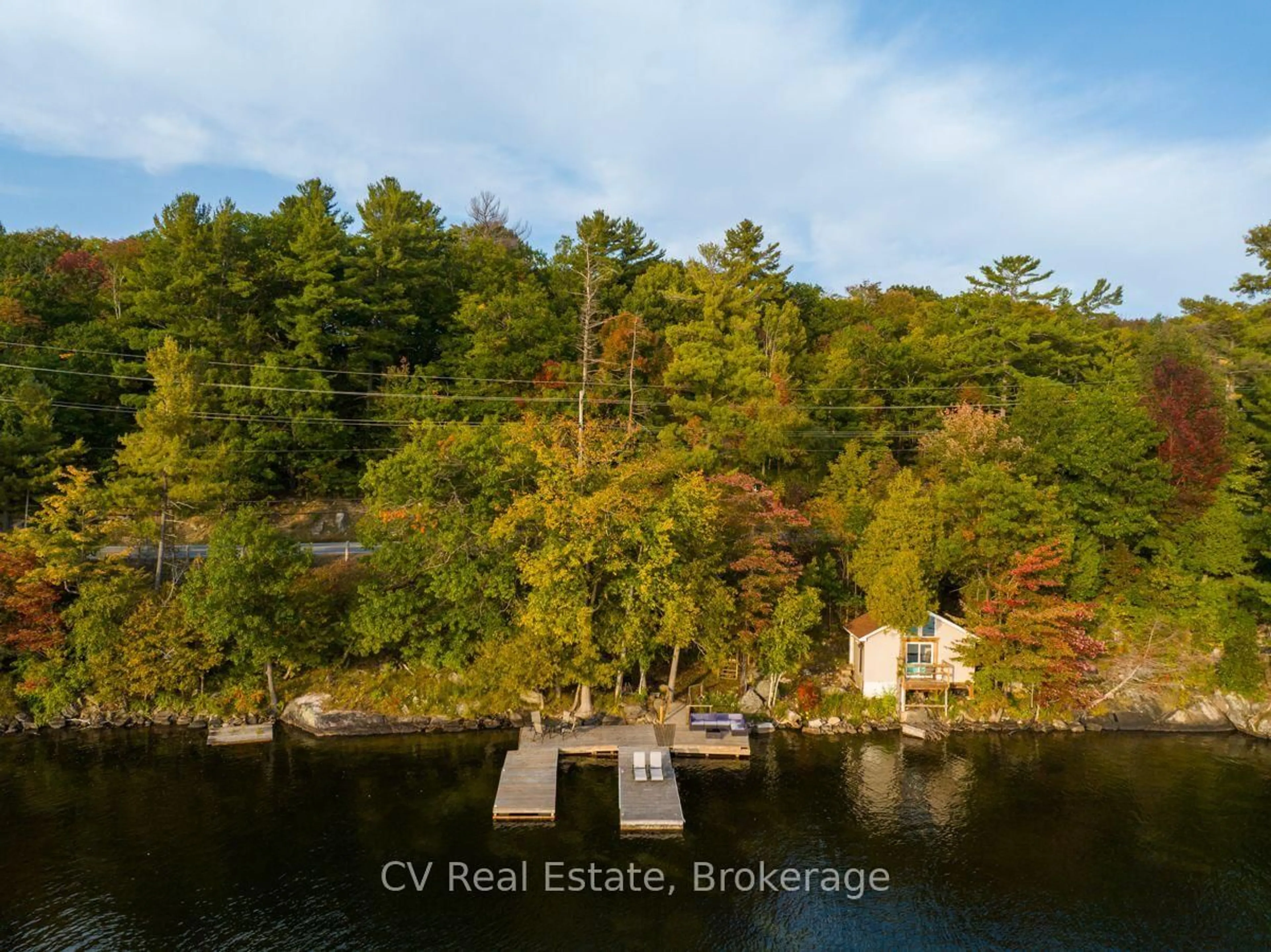 A pic from outside/outdoor area/front of a property/back of a property/a pic from drone, water/lake/river/ocean view for 1356 & 1357 Peninsula Rd, Muskoka Lakes Ontario P0B 1J0