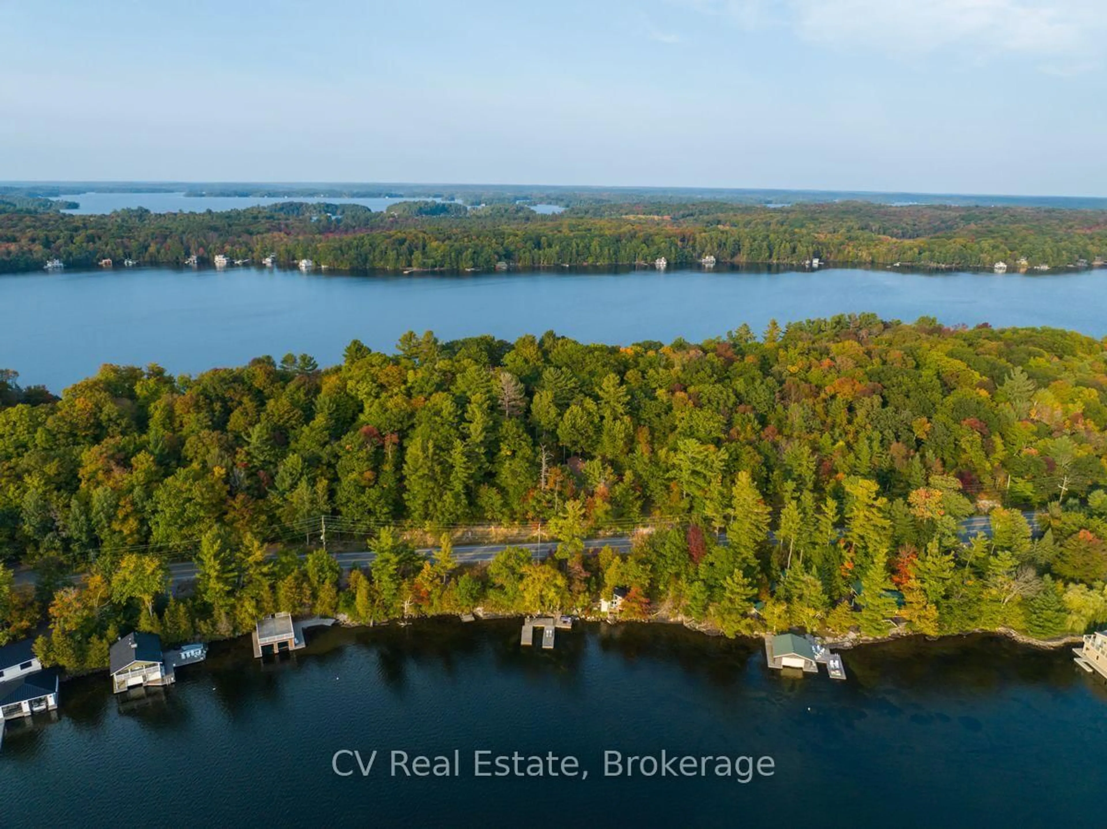 A pic from outside/outdoor area/front of a property/back of a property/a pic from drone, water/lake/river/ocean view for 1356 & 1357 Peninsula Rd, Muskoka Lakes Ontario P0B 1J0