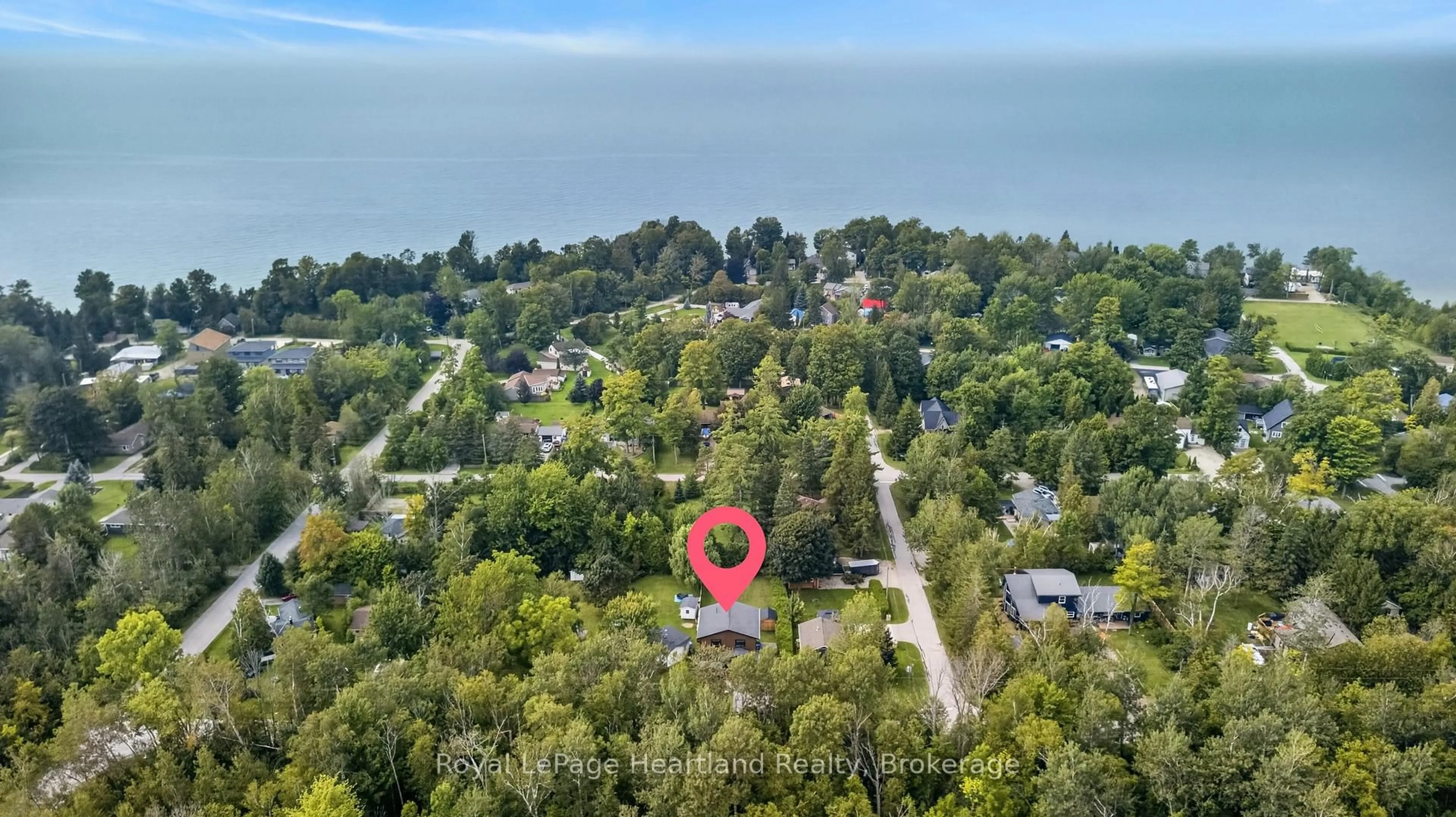 A pic from outside/outdoor area/front of a property/back of a property/a pic from drone, water/lake/river/ocean view for 11 Maitland Ave, Central Huron Ontario N7A 3X8