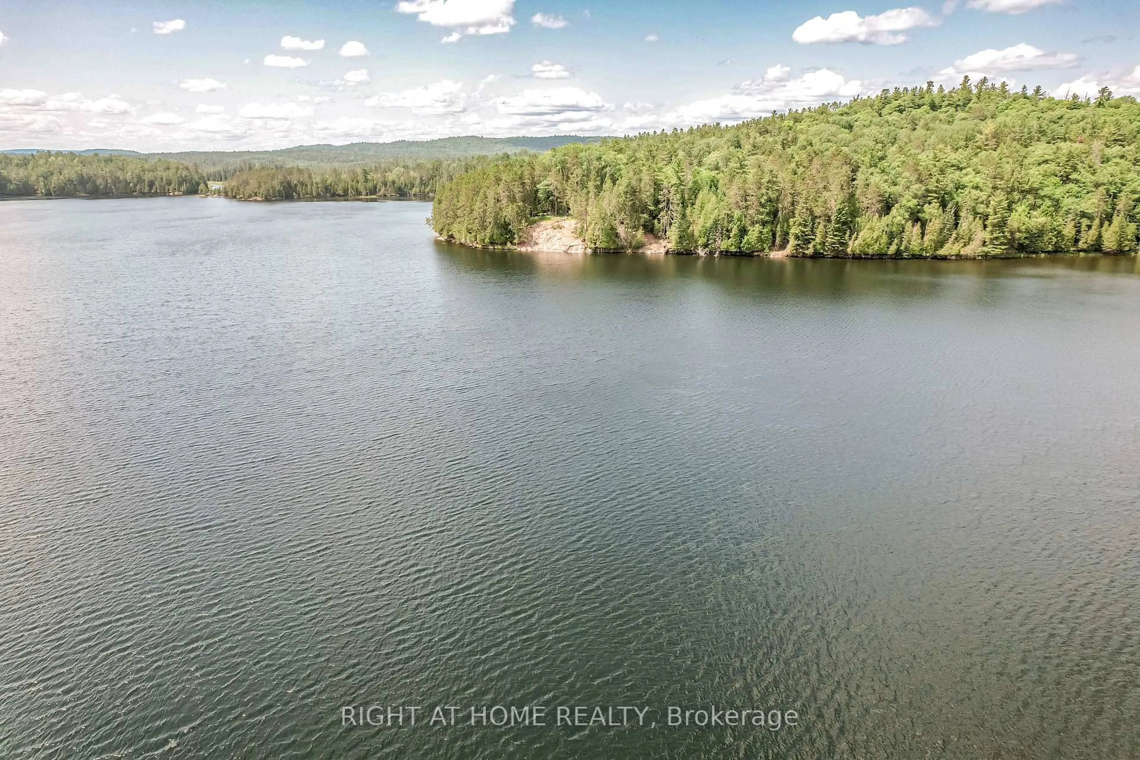 A pic from outside/outdoor area/front of a property/back of a property/a pic from drone, water/lake/river/ocean view for 592 Moccasin Lake Rd, Palmer Rapids Ontario K0J 2E0