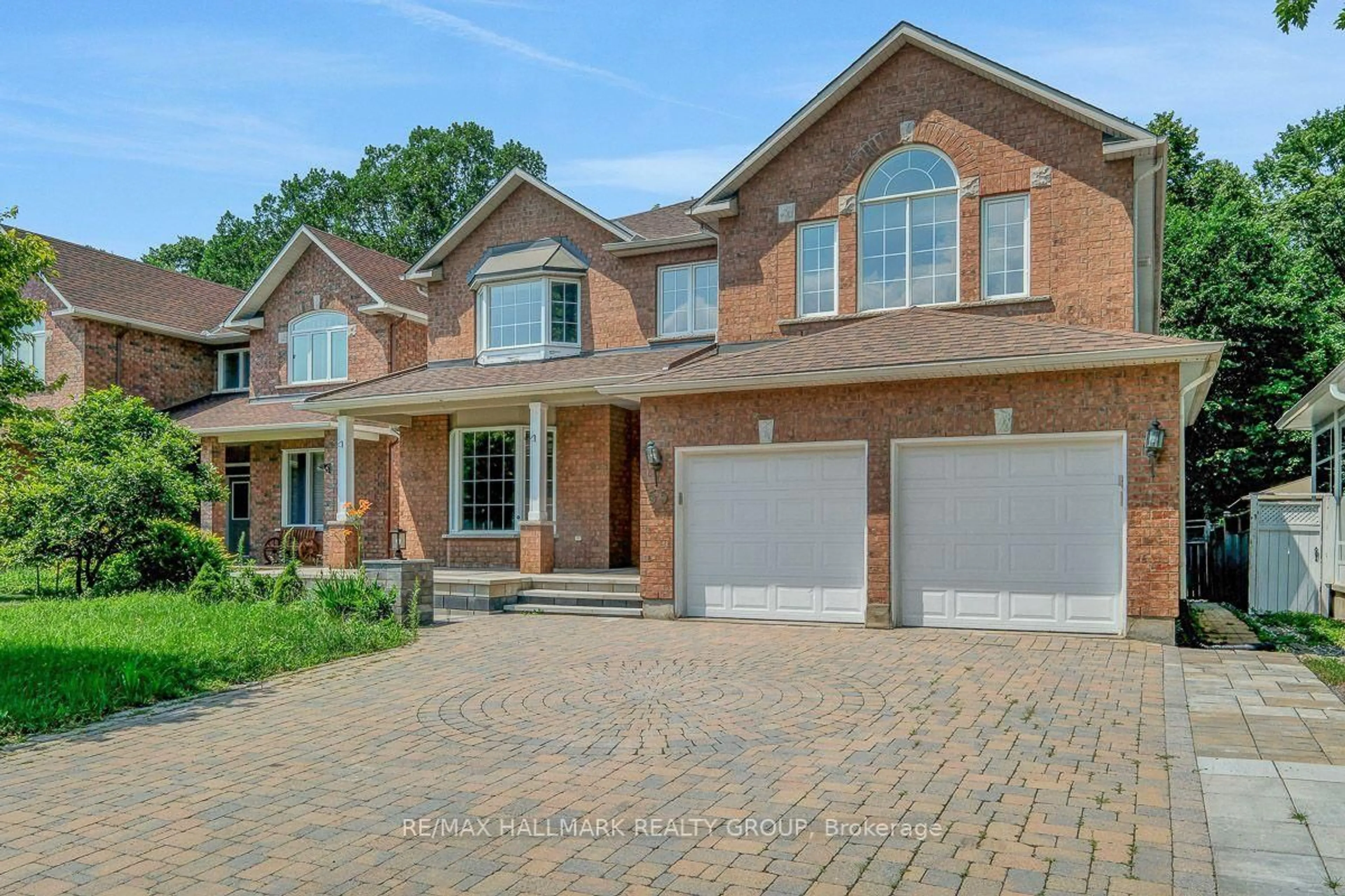 Home with brick exterior material, street for 55 Maple Stand Way, Ottawa Ontario K2G 6R4