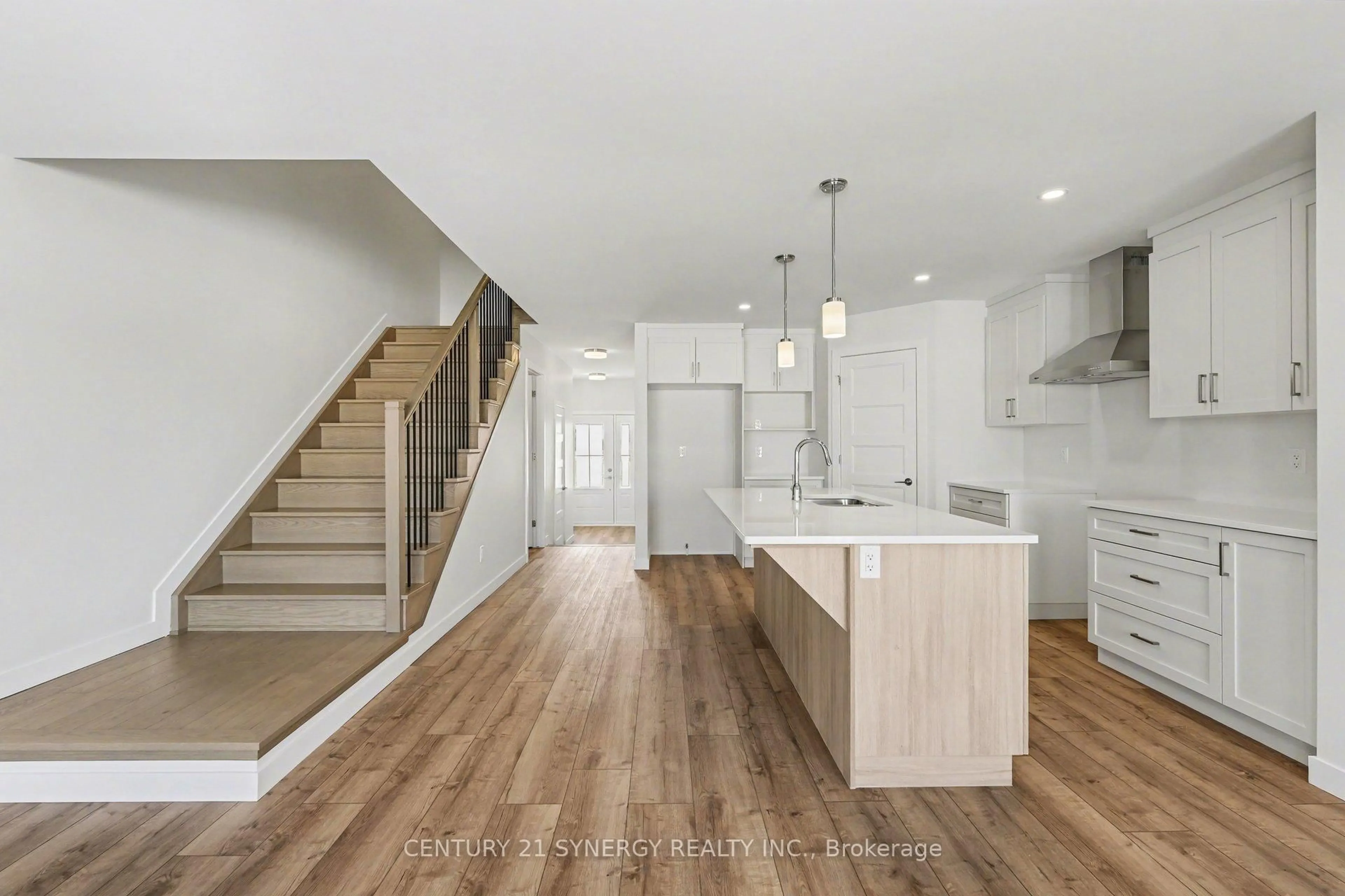 Open concept kitchen, wood/laminate floor for 29 Helen St, North Stormont Ontario K0A 1R0