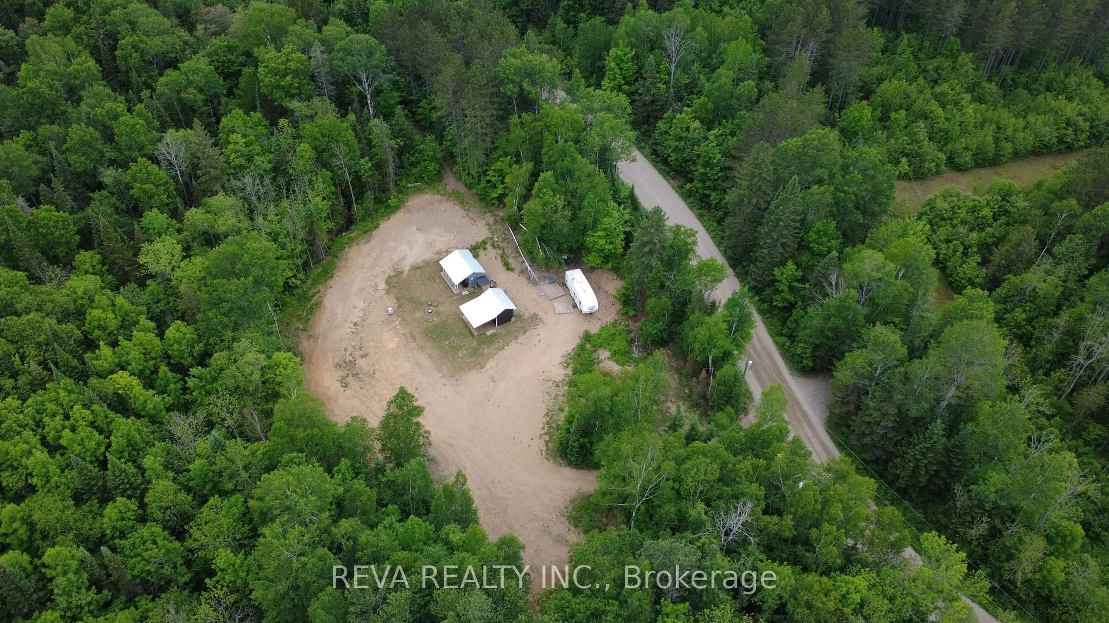 A pic from outside/outdoor area/front of a property/back of a property/a pic from drone, unknown for 219 Elgin Rd, Maynooth Ontario K0L 2K0