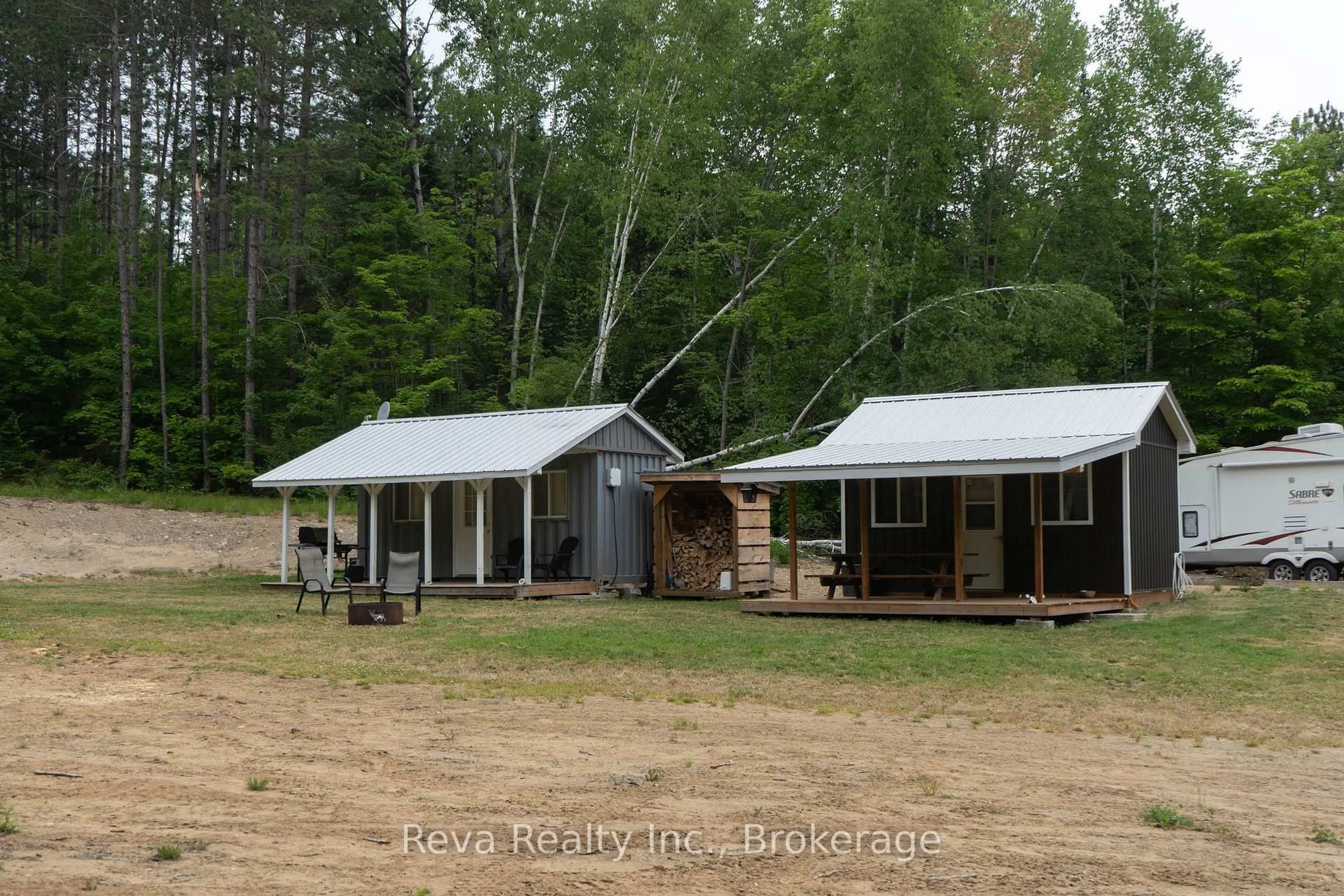 A pic from outside/outdoor area/front of a property/back of a property/a pic from drone, building for 219 Elgin Rd, Maynooth Ontario K0L 2K0