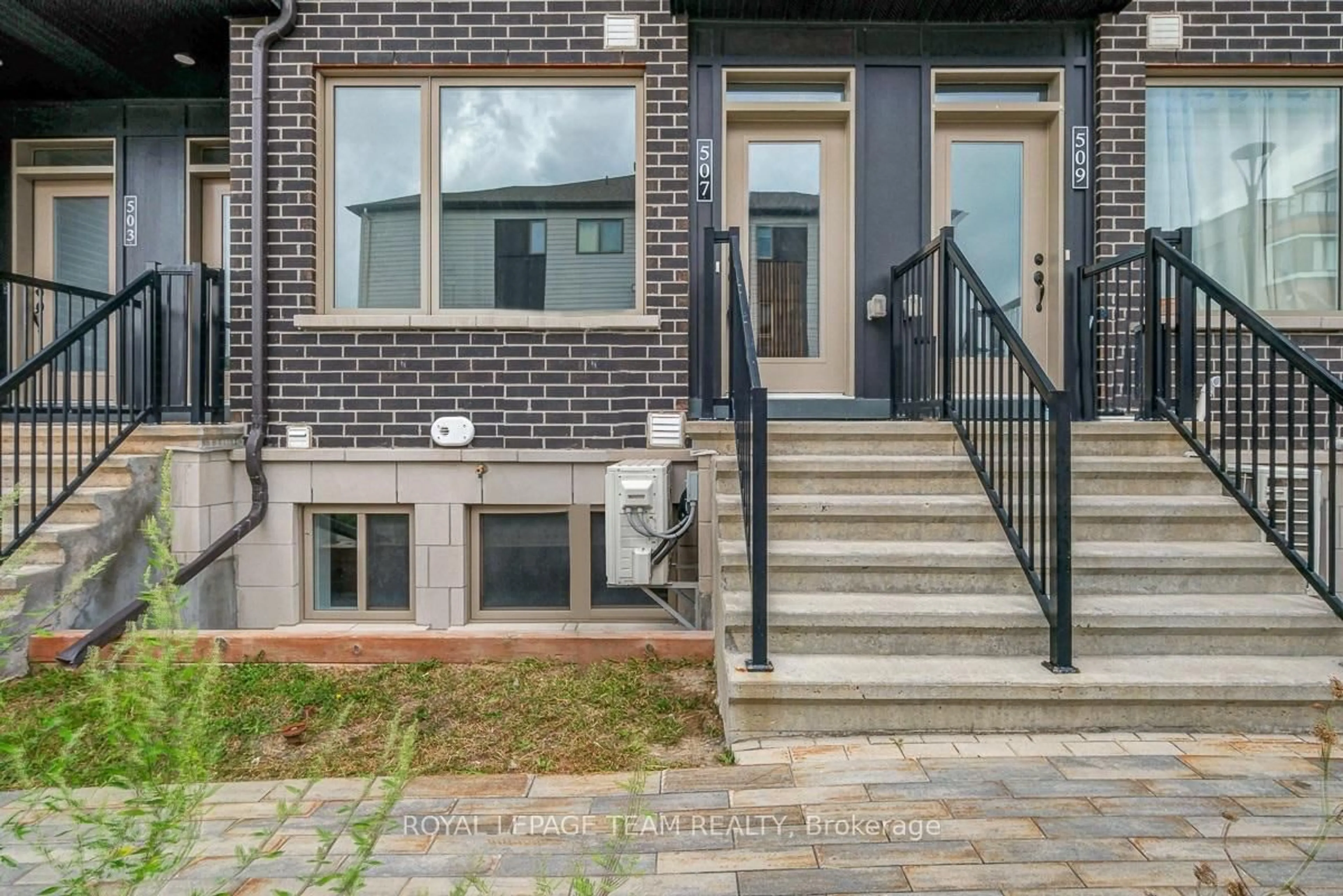 Home with brick exterior material, street for 507 Takamose Private, Ottawa Ontario K1K 5A5