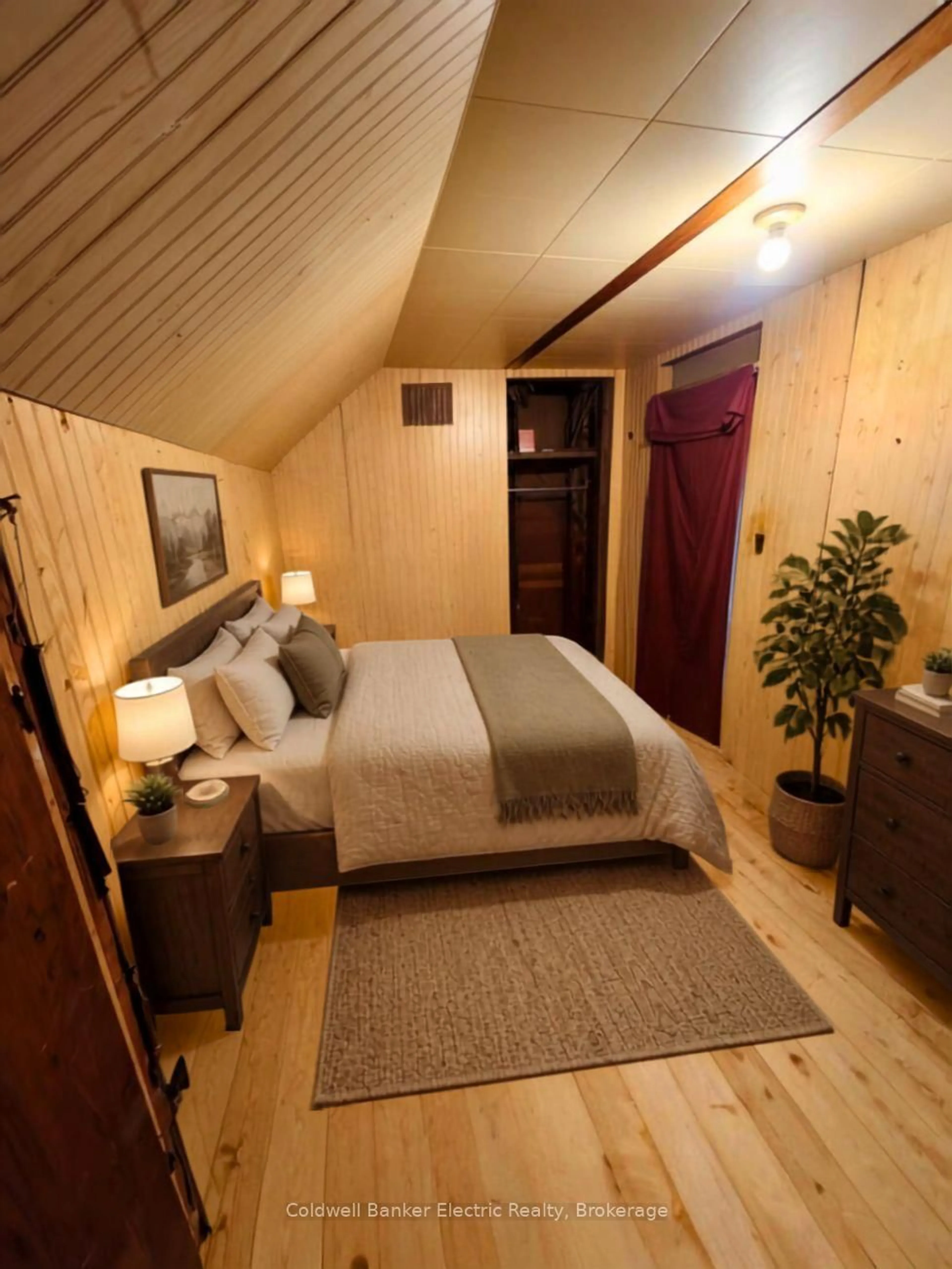 Bedroom with bed, wood/laminate floor for 24 Victoria St, Kawartha Lakes Ontario K0L 2W0