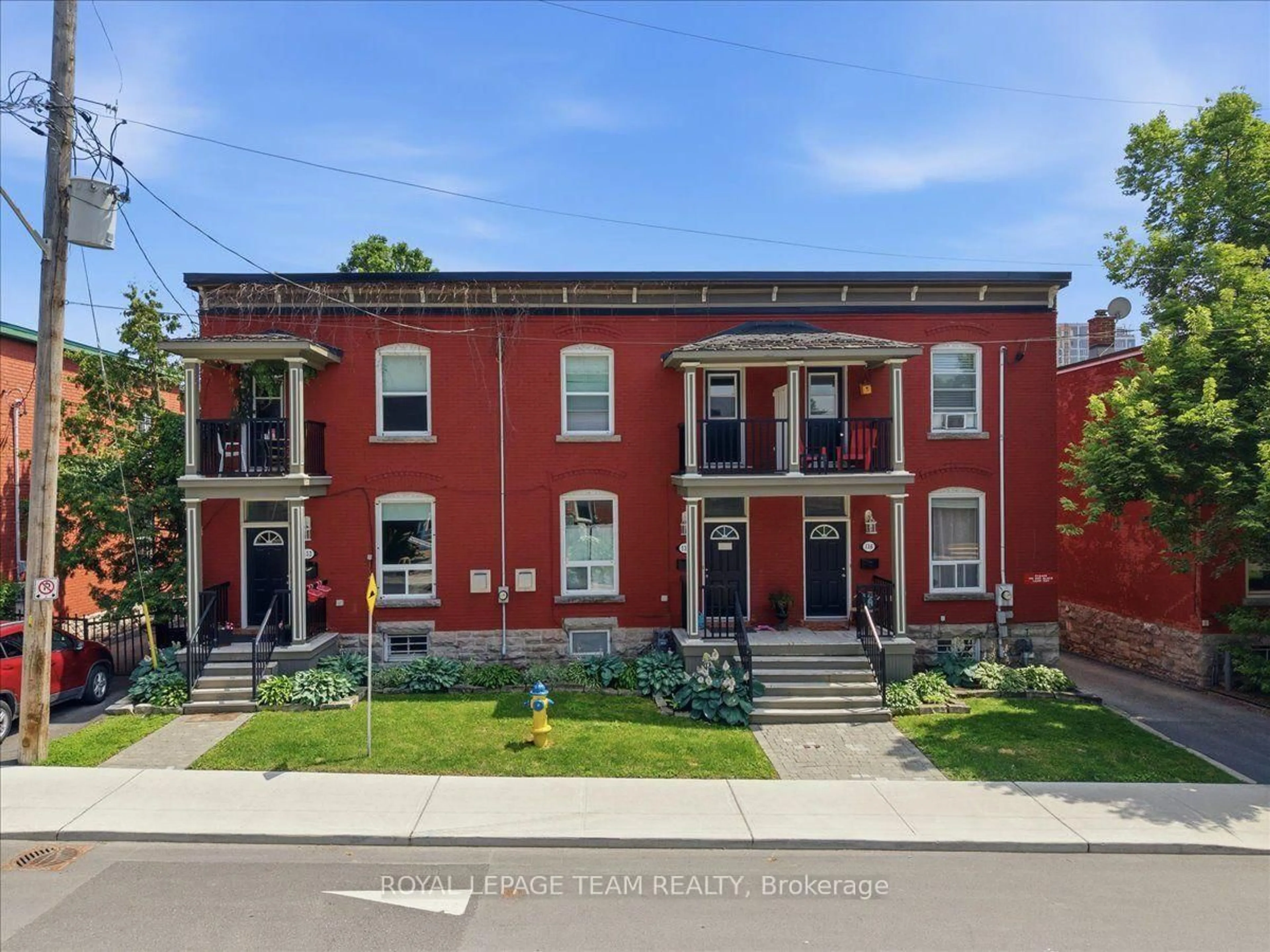 Home with brick exterior material, street for 136 Elm St, Ottawa Ontario K1R 6N5