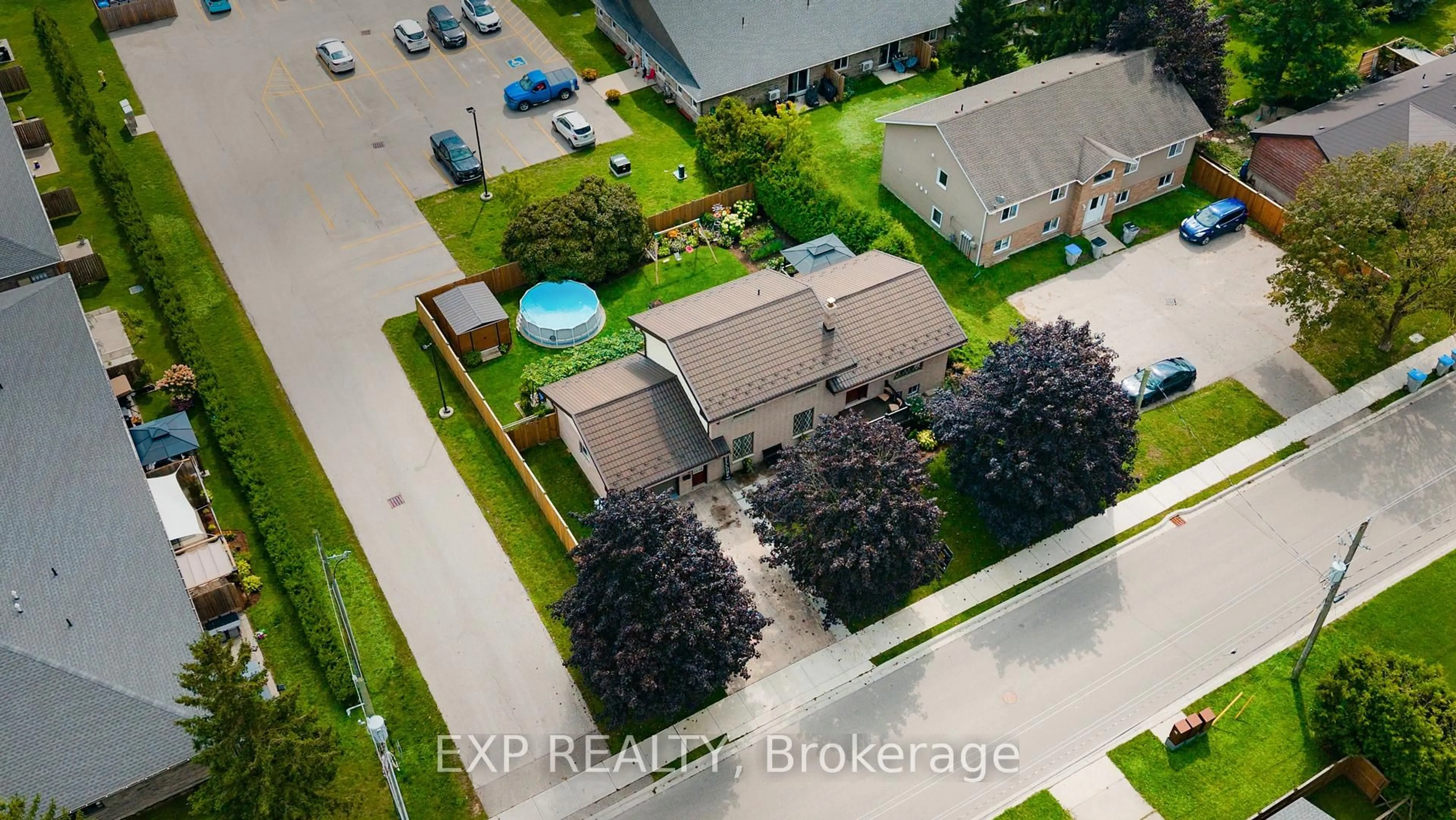 A pic from outside/outdoor area/front of a property/back of a property/a pic from drone, street for 590 Albert Ave, North Perth Ontario N4W 1V5