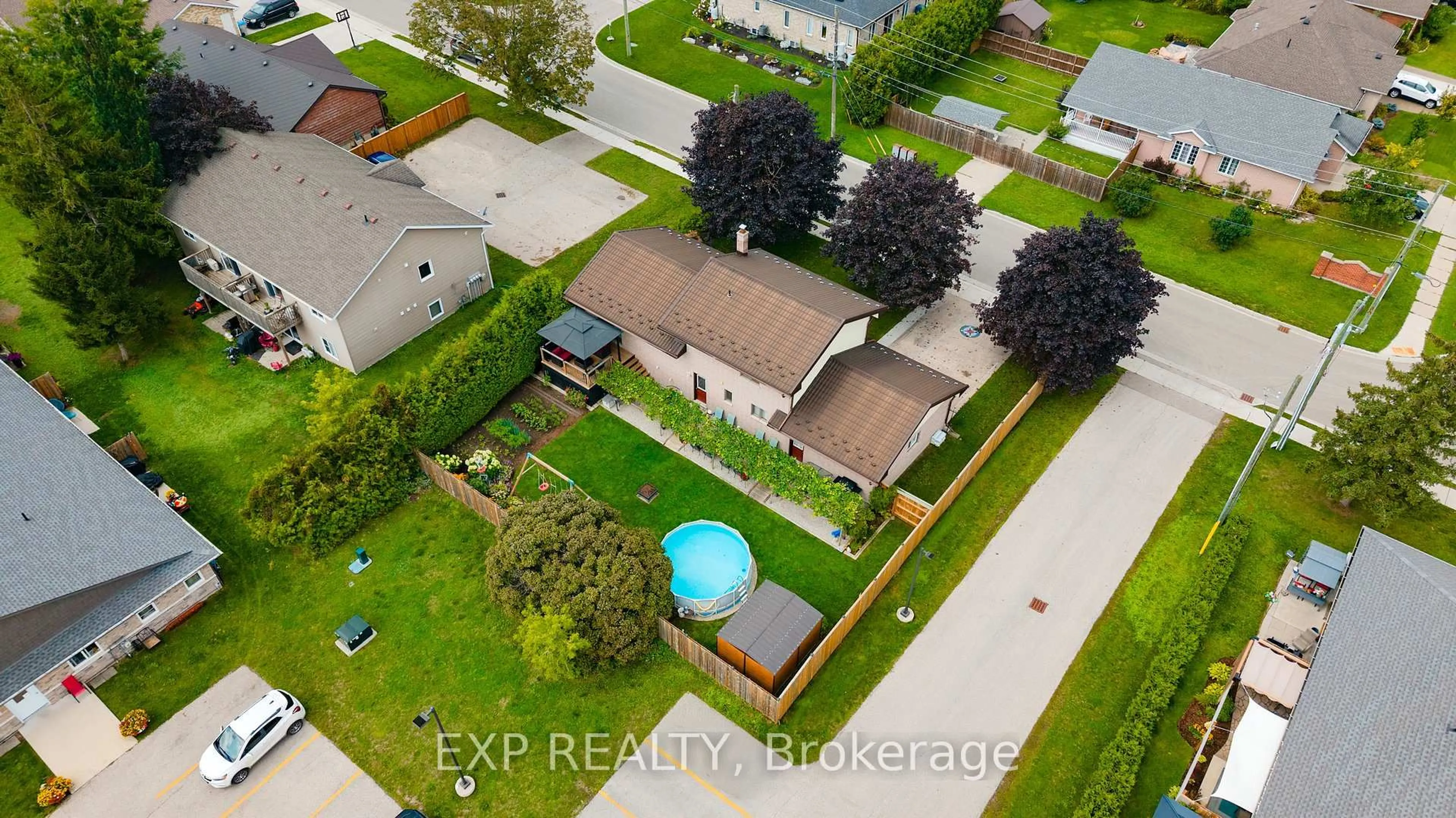 A pic from outside/outdoor area/front of a property/back of a property/a pic from drone, street for 590 Albert Ave, North Perth Ontario N4W 1V5