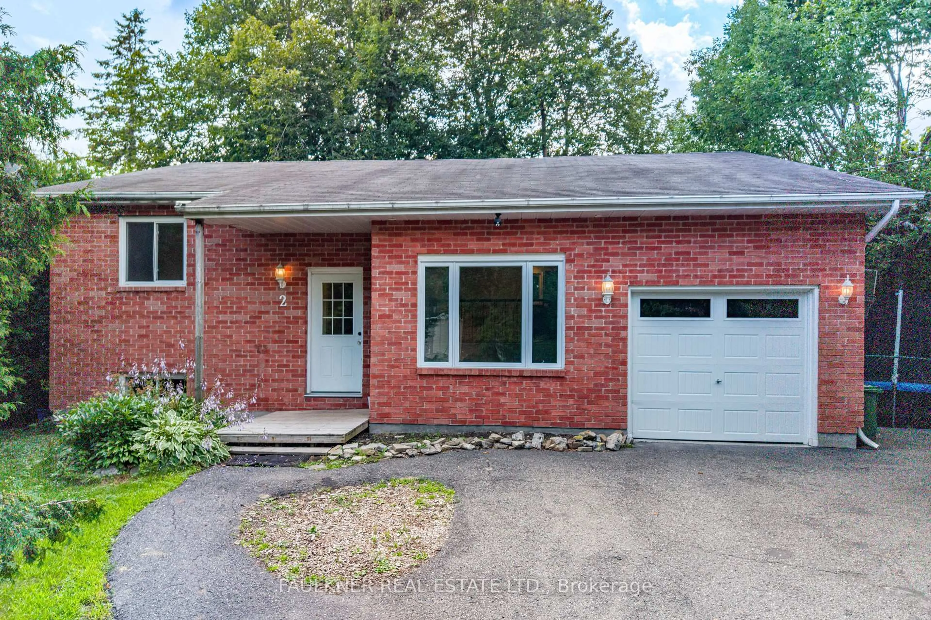 Home with brick exterior material, street for 2 Caribou Ave, Stittsville Ontario K2S 1M5
