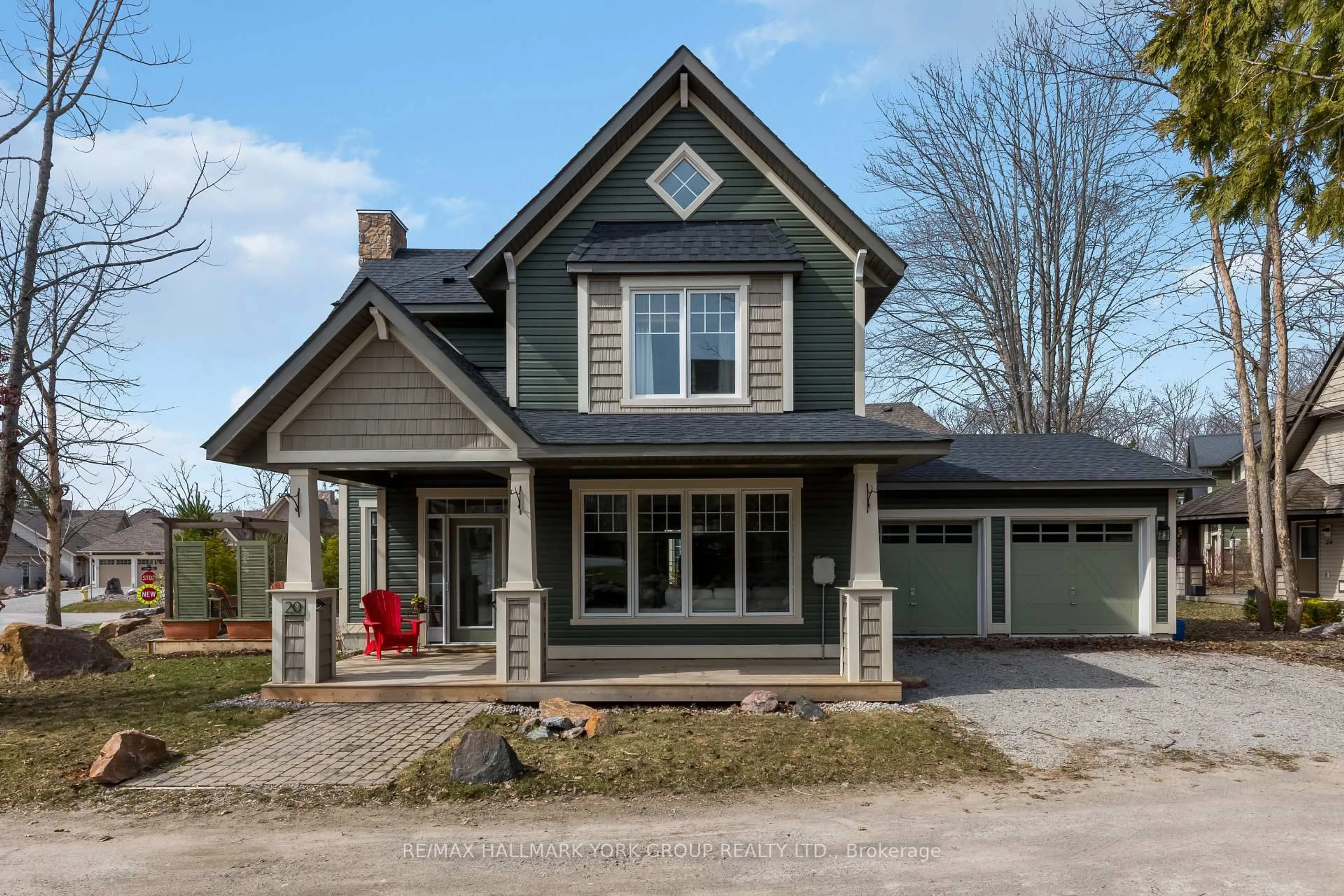 Home with vinyl exterior material, street for 20 Marina Village Dr, Georgian Bay Ontario L0K 1S0