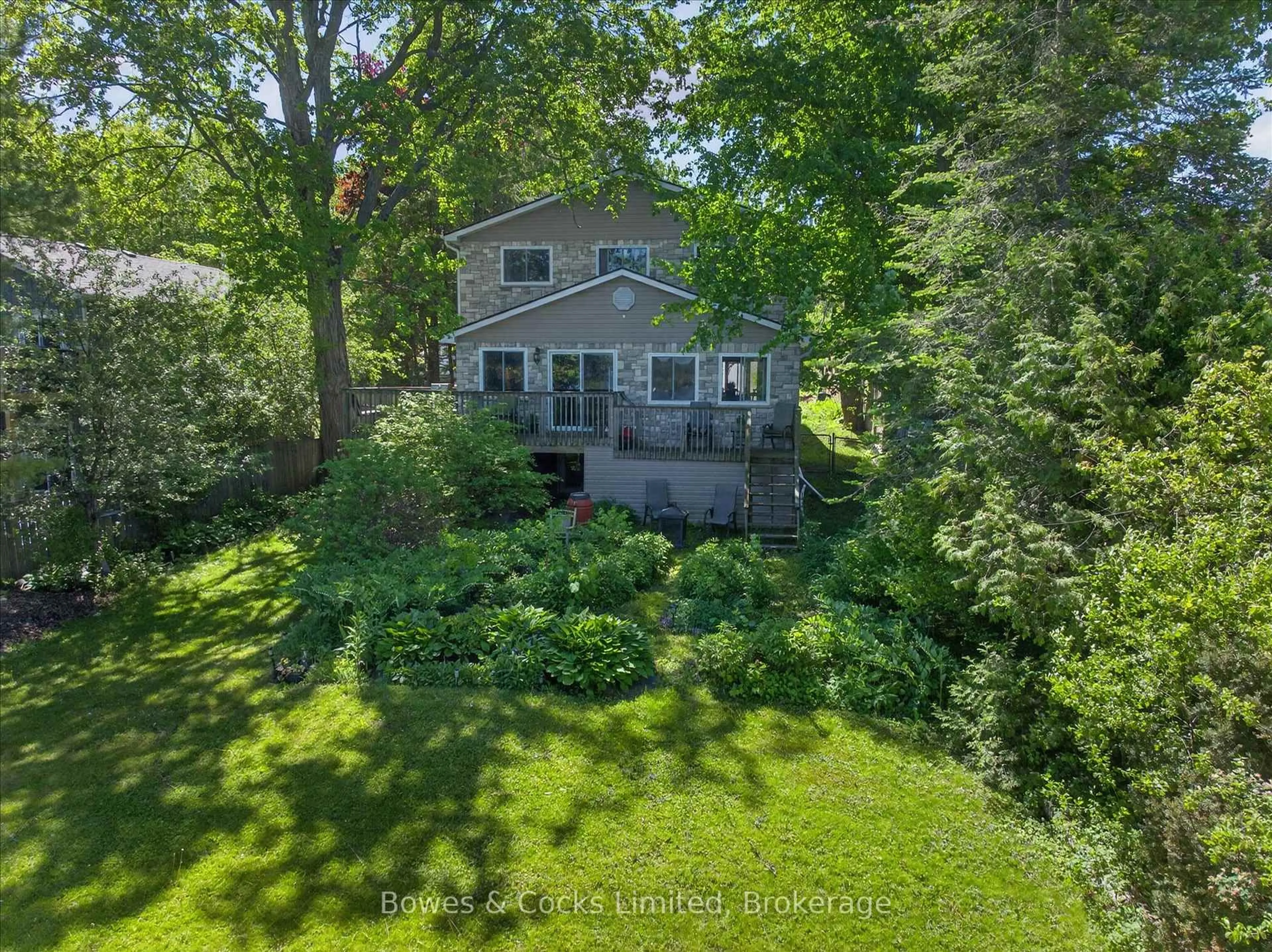 A pic from outside/outdoor area/front of a property/back of a property/a pic from drone, water/lake/river/ocean view for 122 Maryland Dr, Selwyn Ontario K9J 0C5