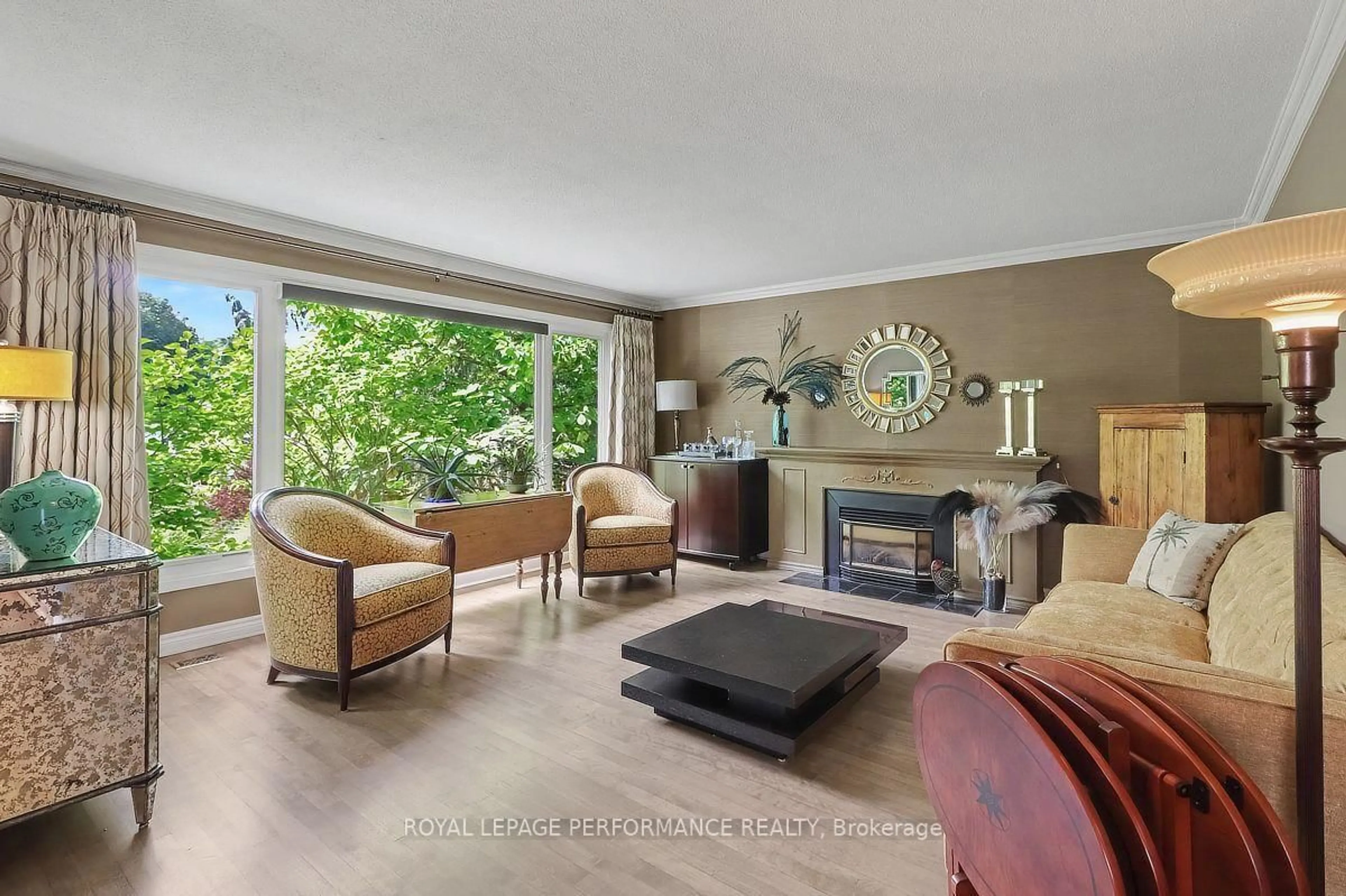 Living room with furniture, unknown for 1147 Parkway Dr, Ottawa Ontario K2C 2W1