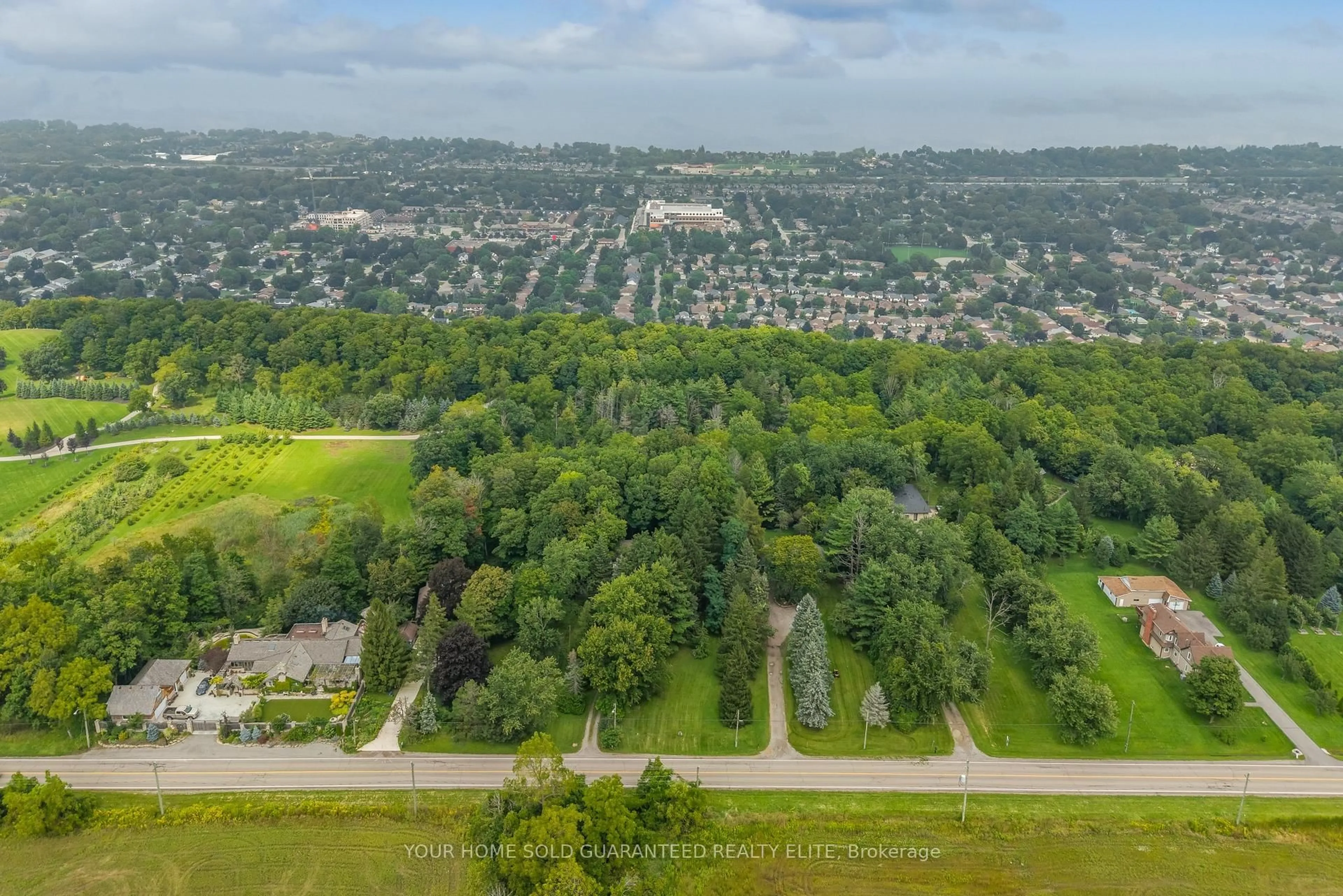 A pic from outside/outdoor area/front of a property/back of a property/a pic from drone, forest/trees view for 155 Ridge Rd, Grimsby Ontario L3M 4E7