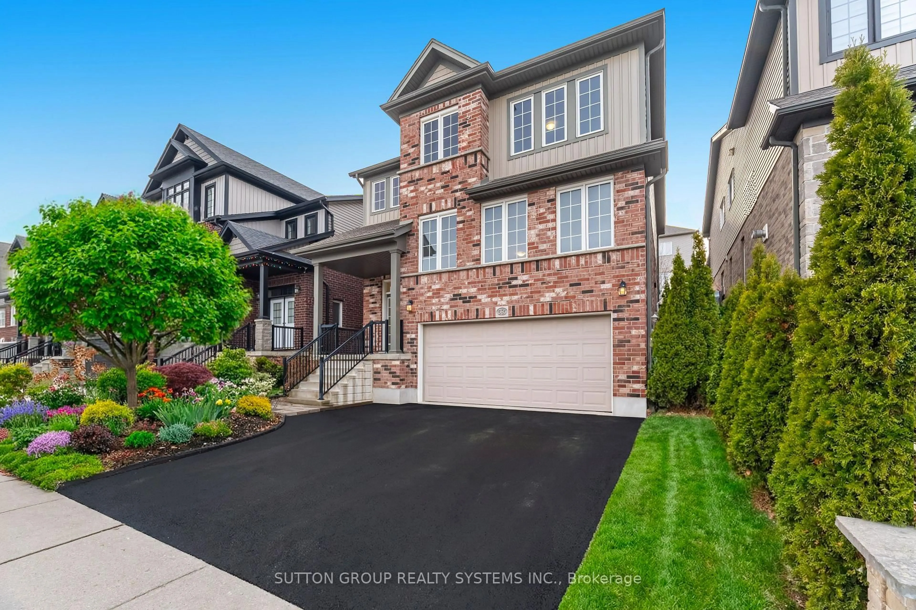 Home with brick exterior material, street for 565 Sundew Dr, Waterloo Ontario N2V 0B9