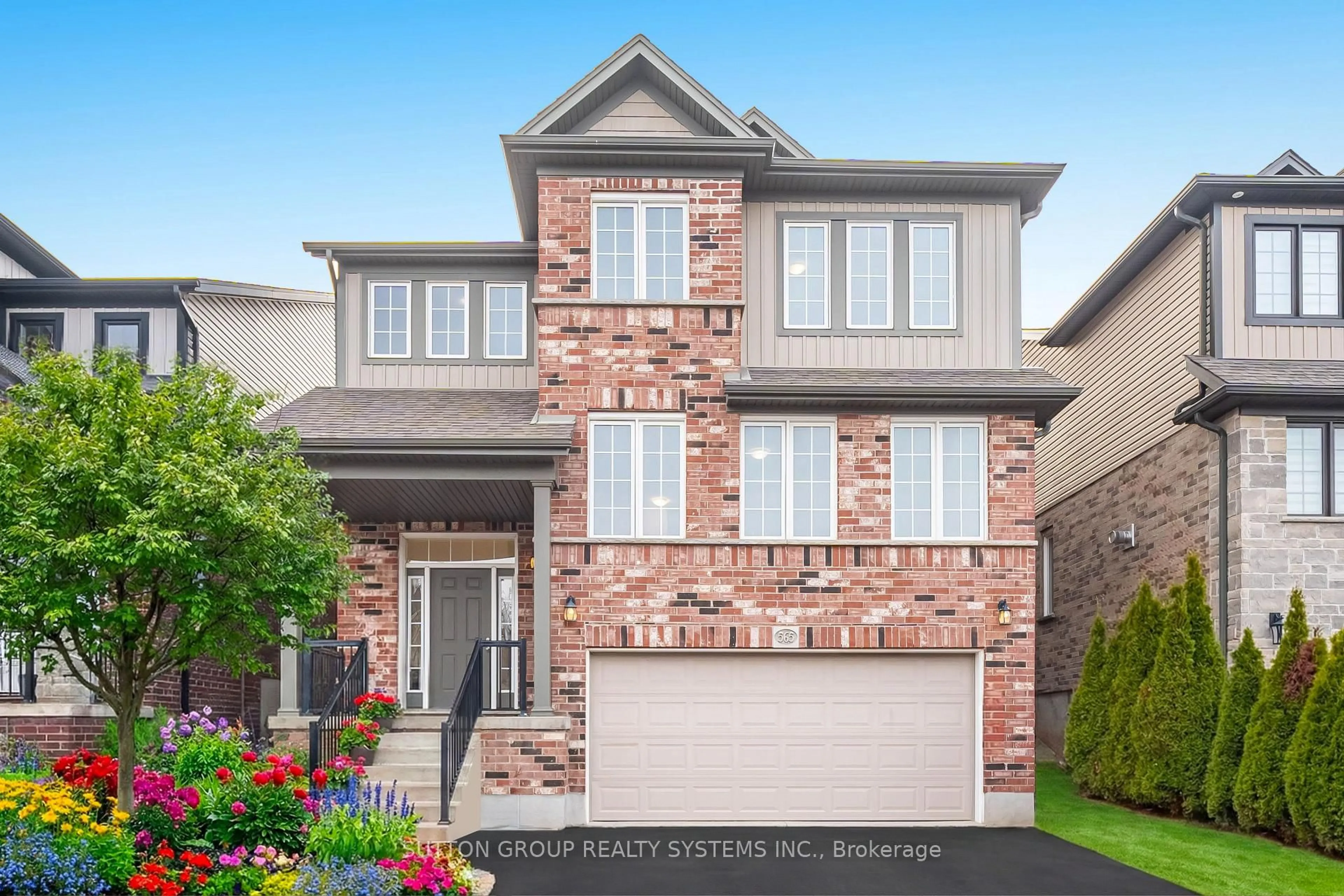 Home with brick exterior material, street for 565 Sundew Dr, Waterloo Ontario N2V 0B9