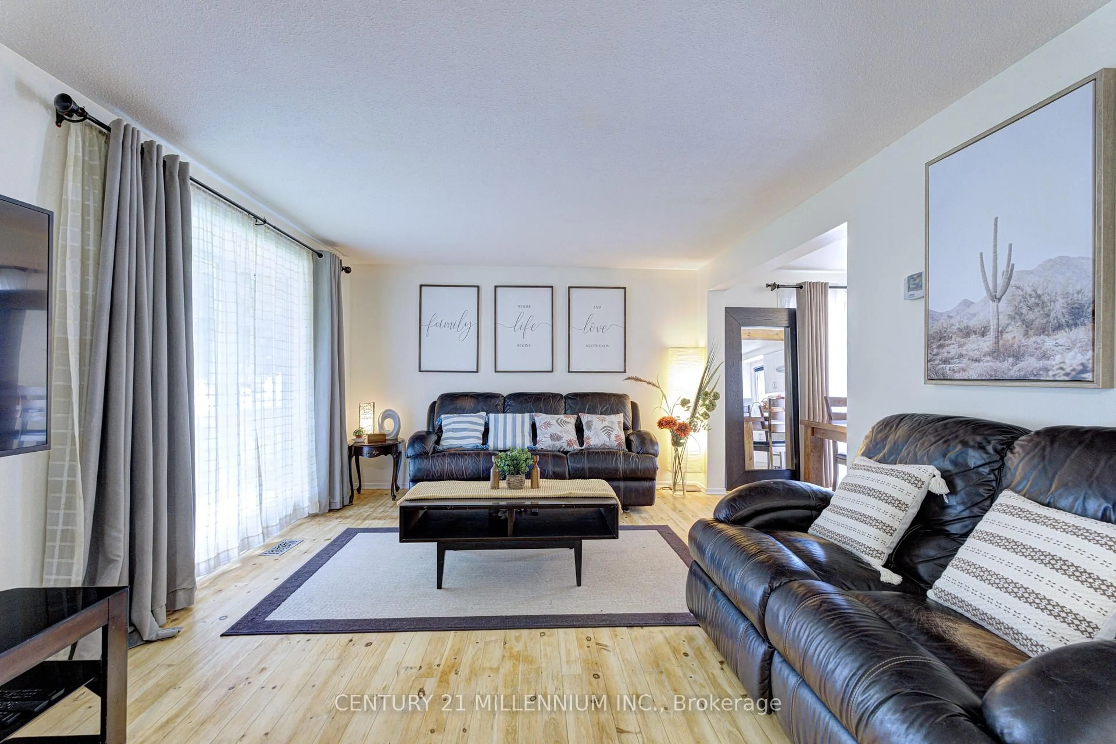 Living room with furniture, wood/laminate floor for 59 Lewis Cres, Kitchener Ontario N2A 2T7