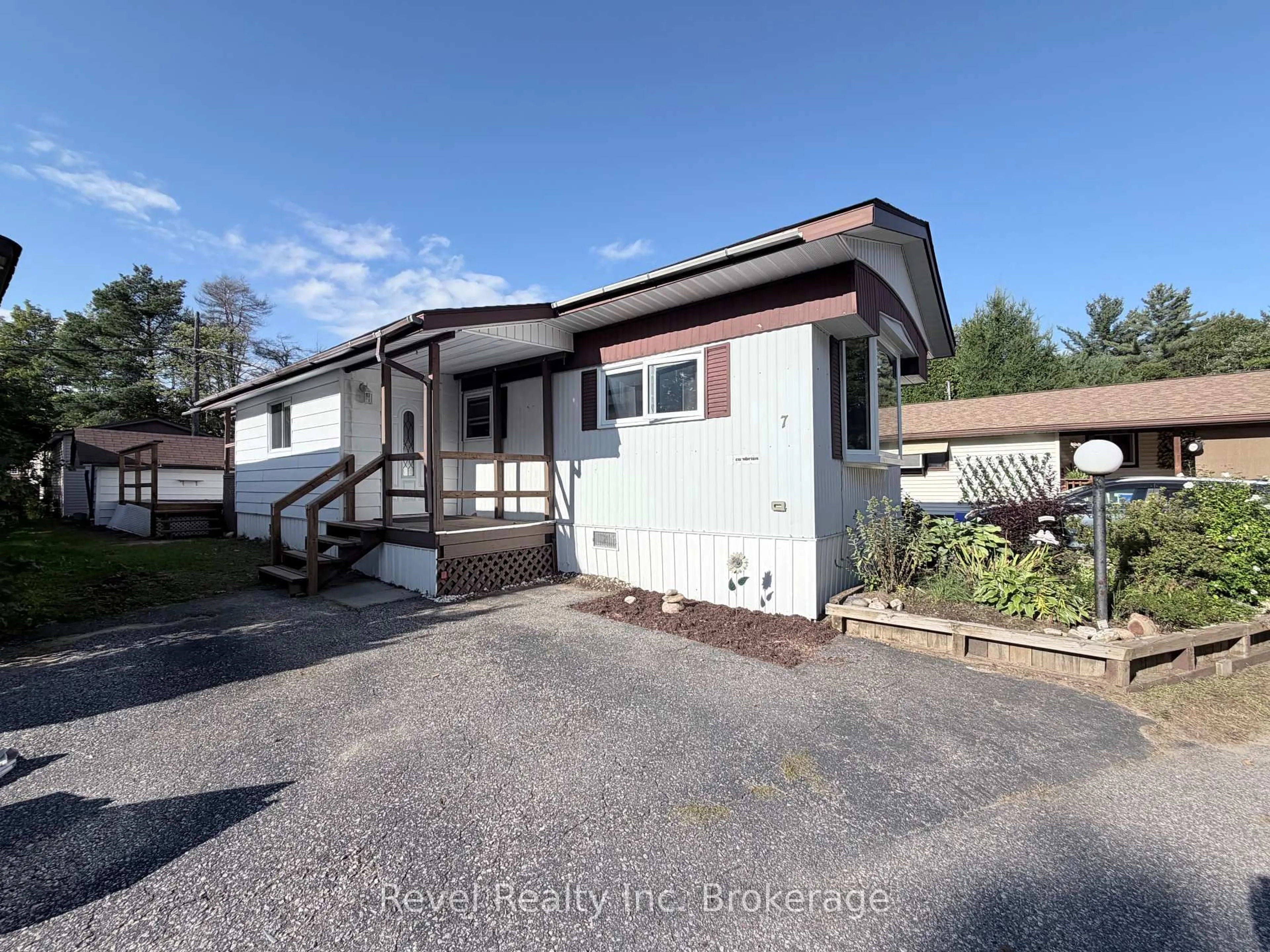 Home with vinyl exterior material, unknown for 208 Little Down Lane #7, North Bay Ontario P1B 8G2