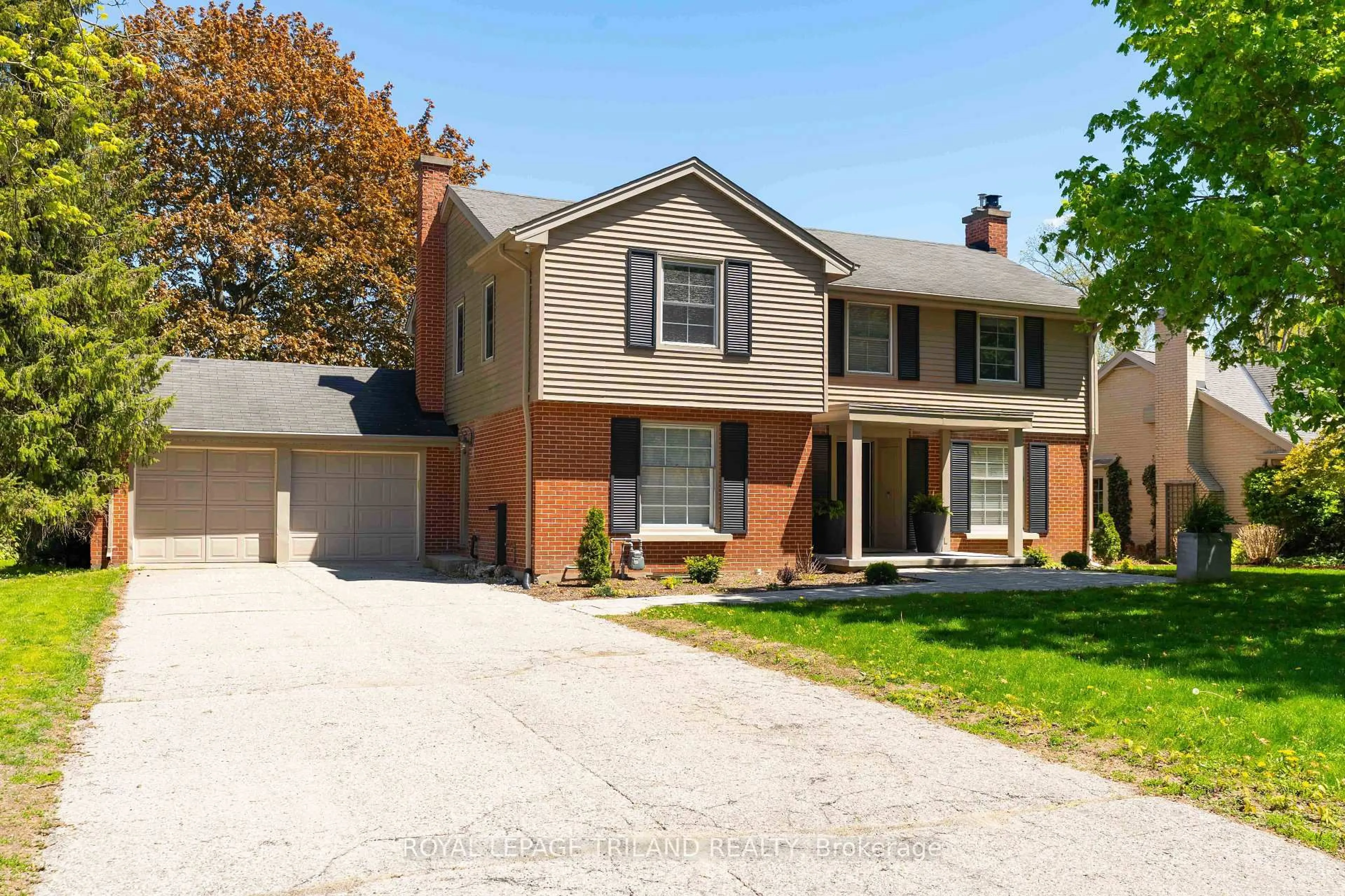 Home with brick exterior material, street for 1104 The Pkwy, London East Ontario N6A 2X3