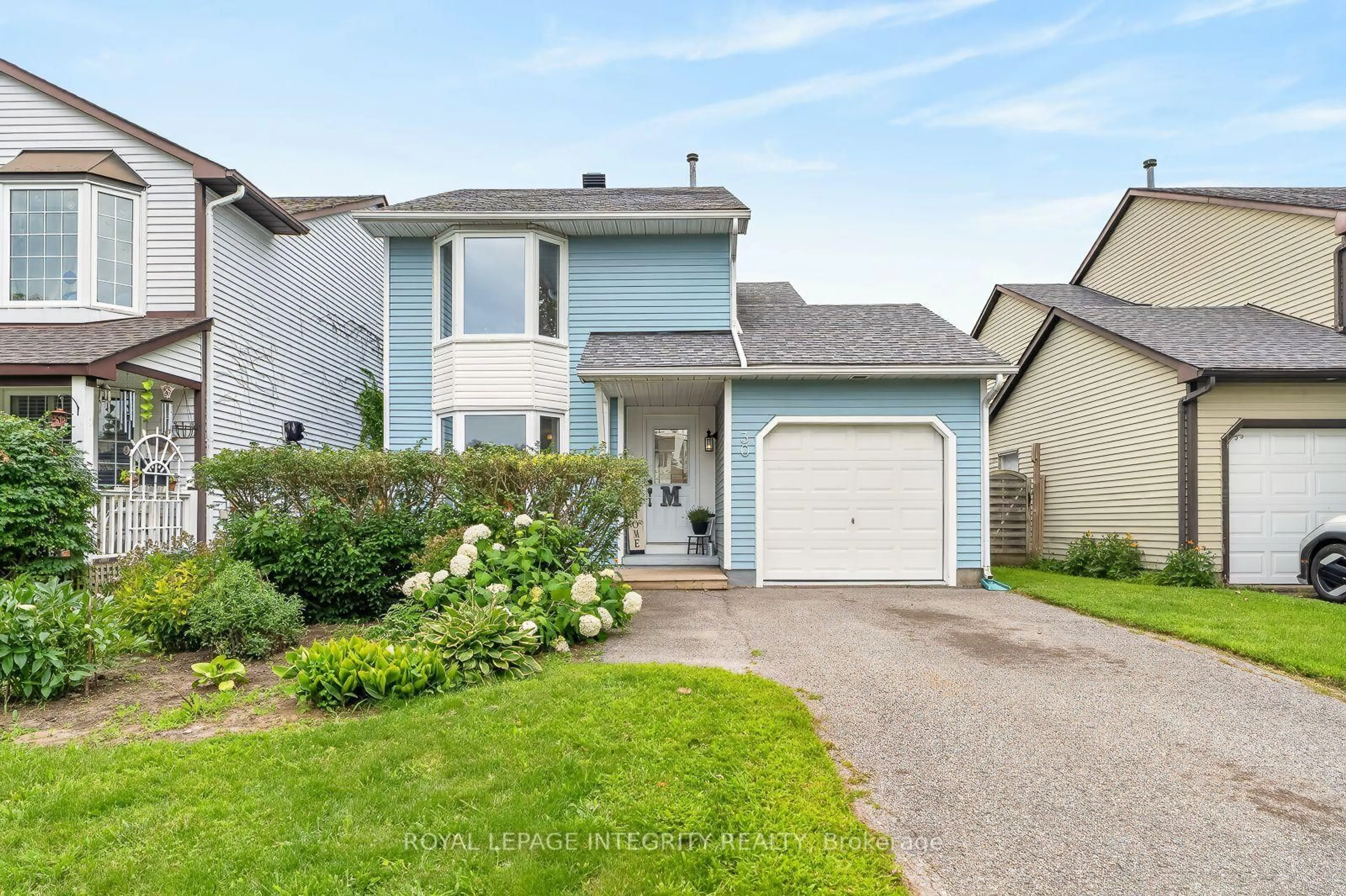 Home with vinyl exterior material, street for 30 Sumner St, Kanata Ontario K2L 2J9