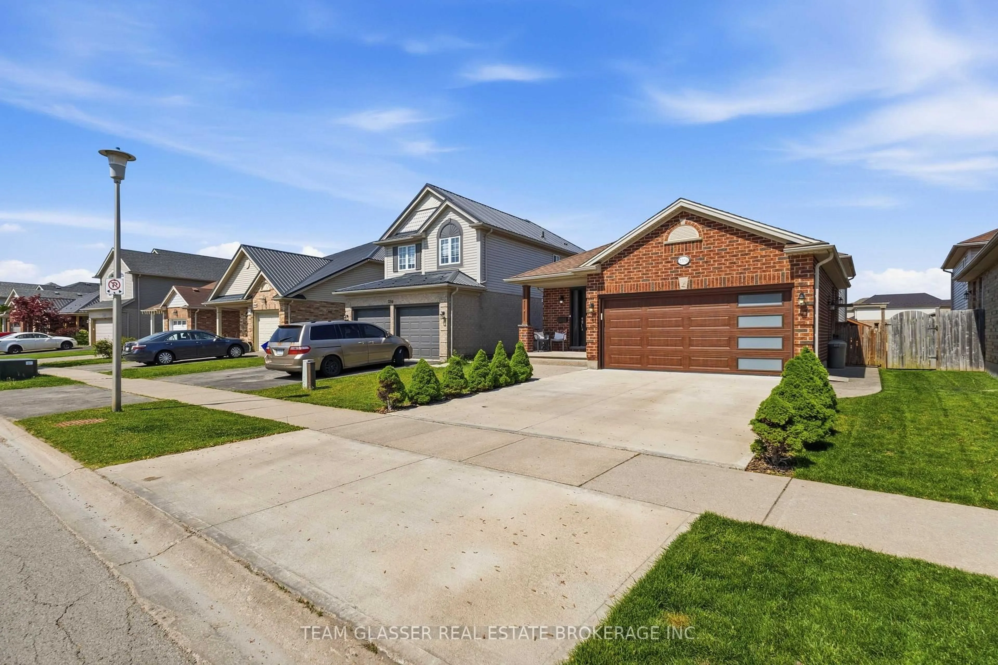 Home with brick exterior material, street for 2334 MEADOWGATE Blvd, London South Ontario N6M 1L6