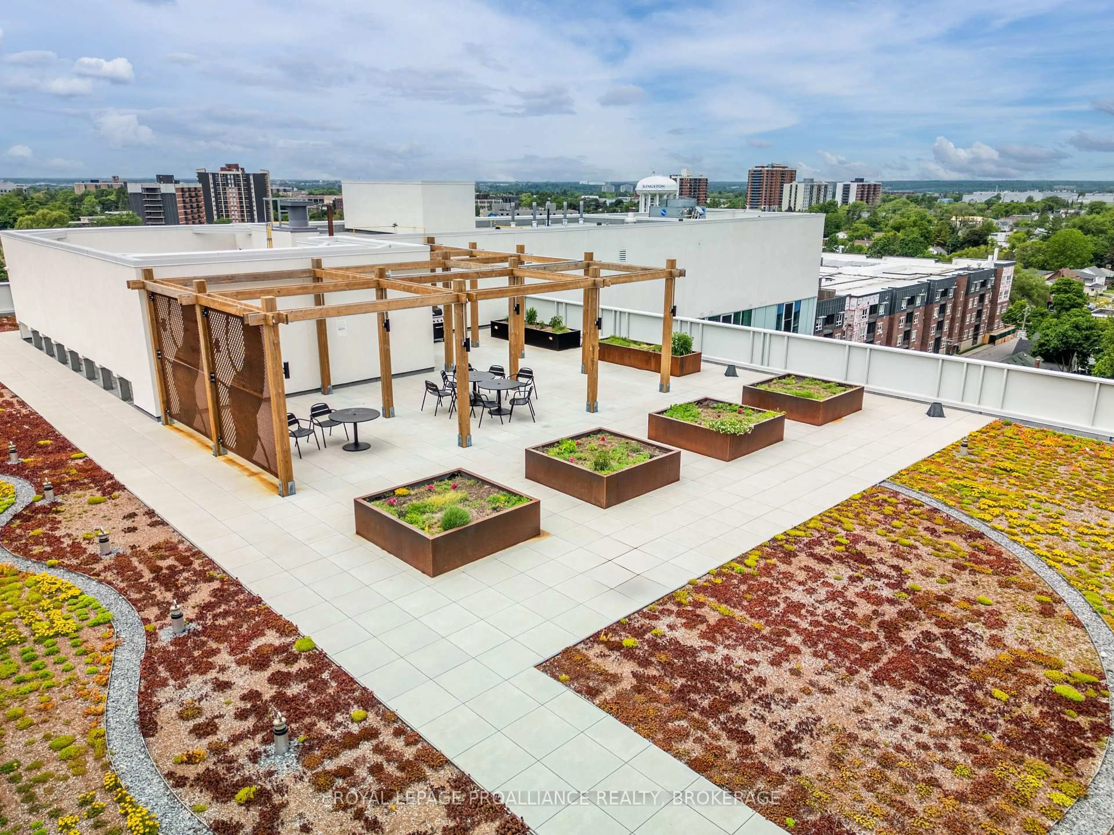 Patio, city buildings view from balcony for 652 Princess St #425, Kingston Ontario K7L 1E5