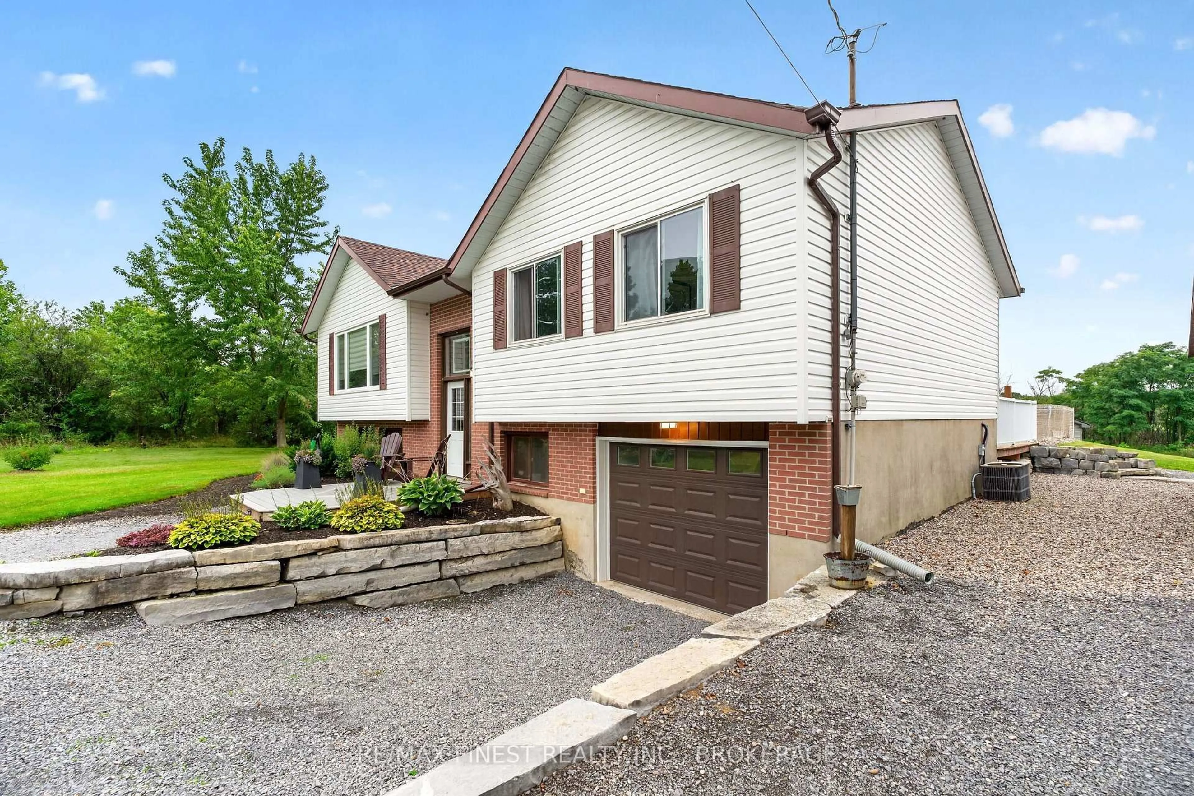 Home with brick exterior material, street for 2359 Keeley Rd, Sydenham Ontario K0H 2T0