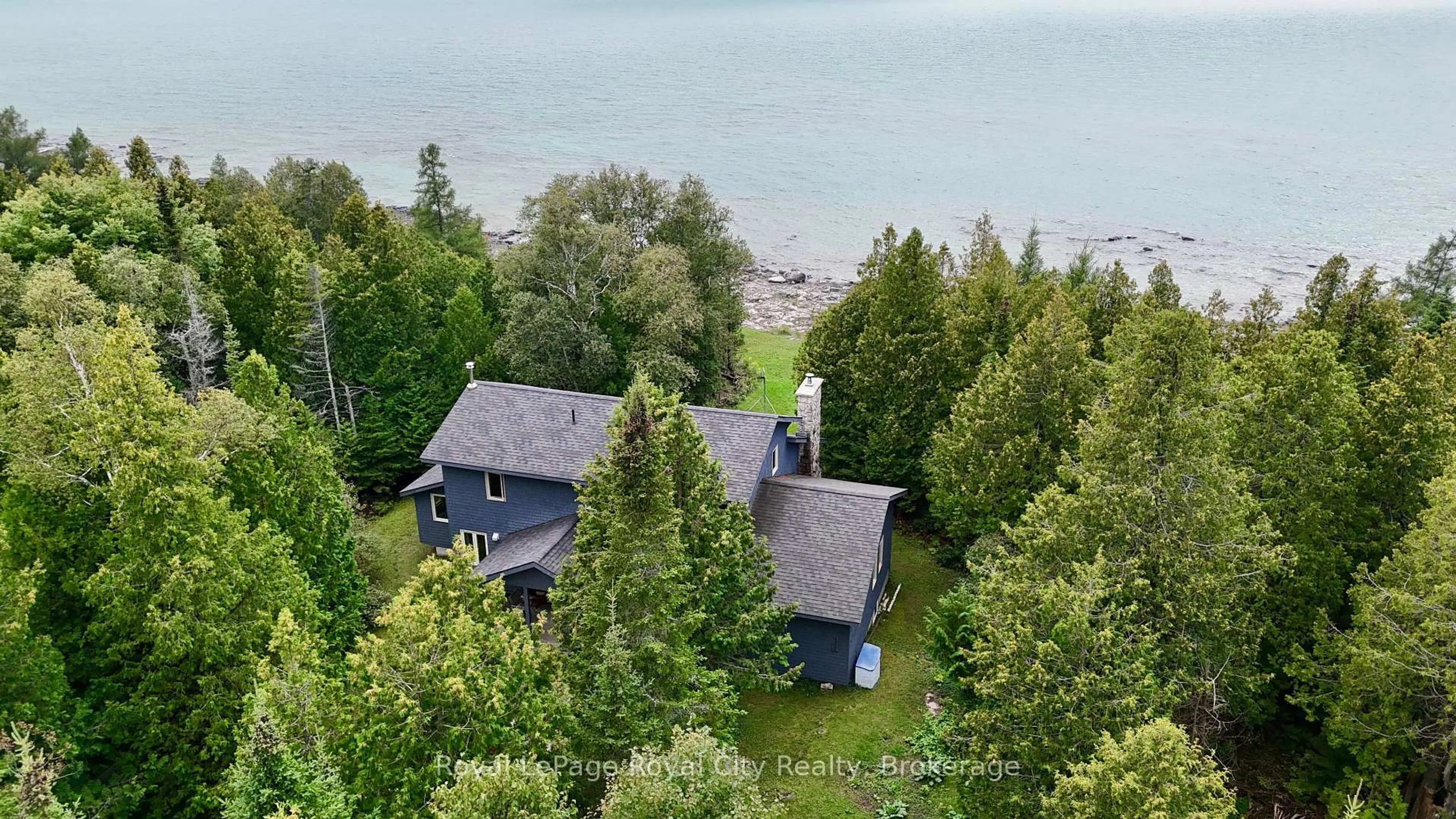 A pic from outside/outdoor area/front of a property/back of a property/a pic from drone, water/lake/river/ocean view for 15 Hawes Rd, Northern Bruce Peninsula Ontario N0H 1W0