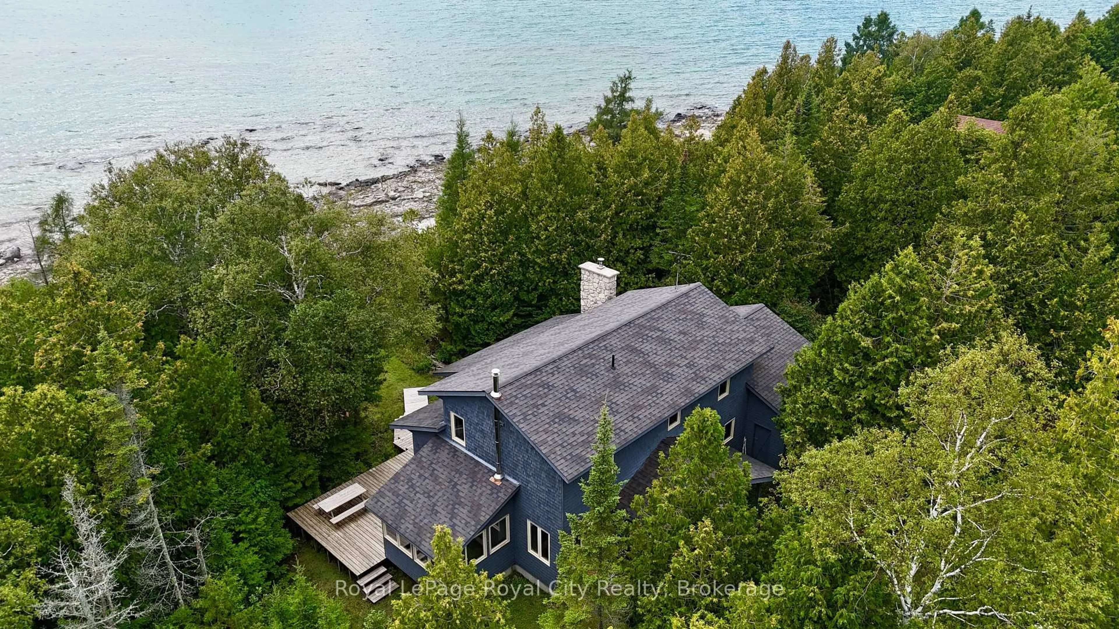 A pic from outside/outdoor area/front of a property/back of a property/a pic from drone, water/lake/river/ocean view for 15 Hawes Rd, Northern Bruce Peninsula Ontario N0H 1W0