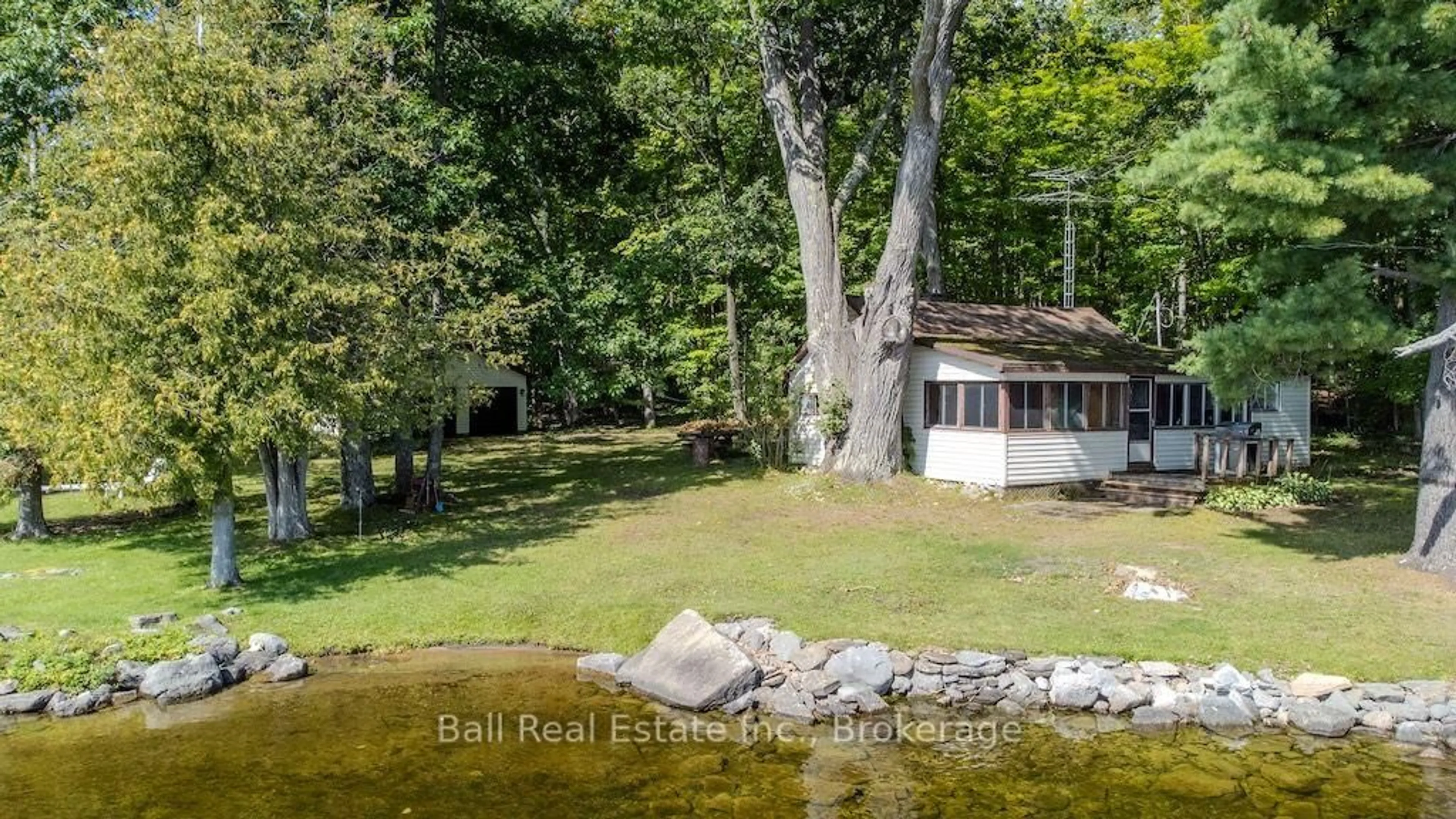 A pic from outside/outdoor area/front of a property/back of a property/a pic from drone, water/lake/river/ocean view for 2875 Pearson Lane, Selwyn Ontario K0L 2H0