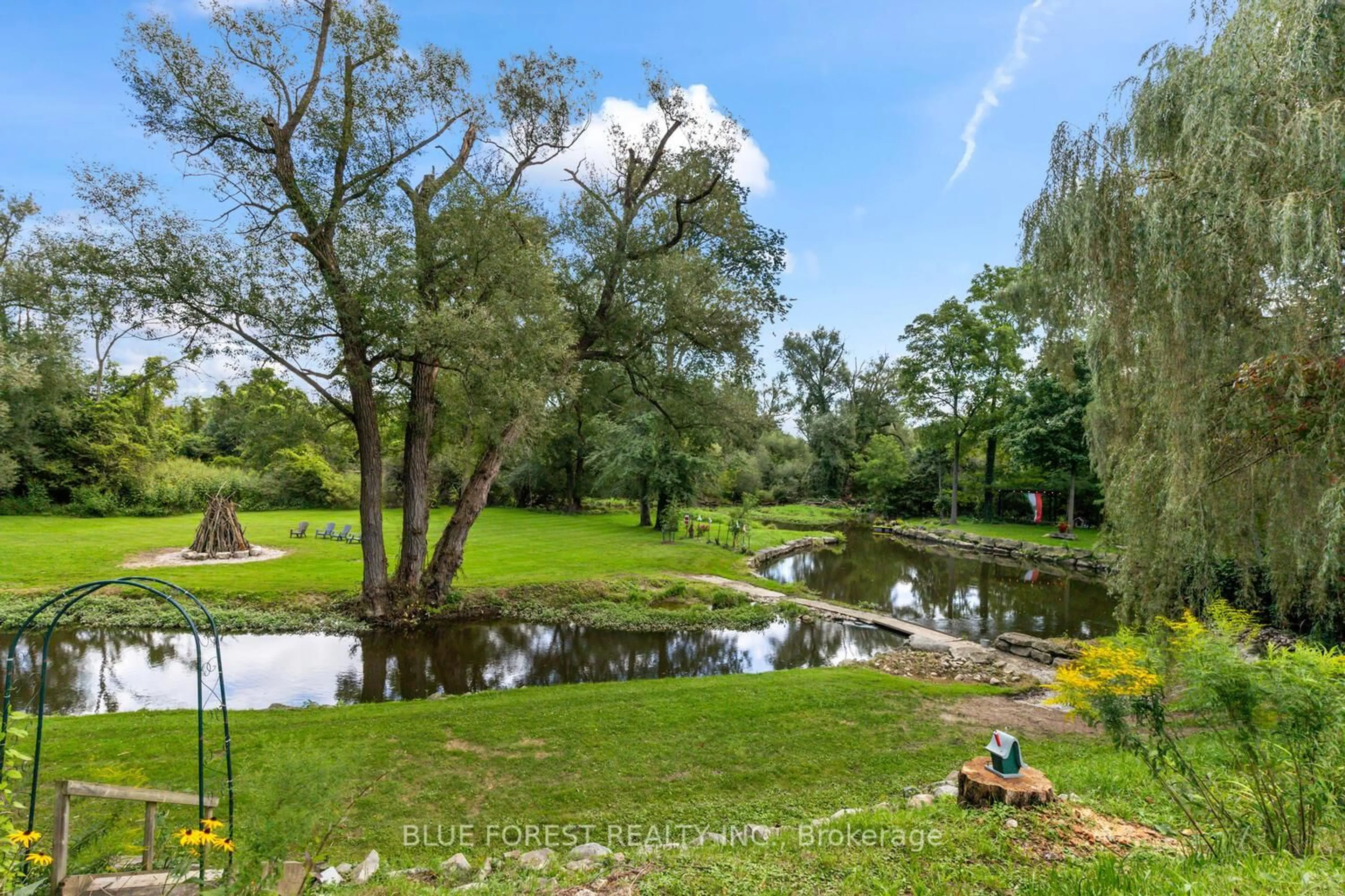 A pic from outside/outdoor area/front of a property/back of a property/a pic from drone, water/lake/river/ocean view for 21948 Adelaide St, Middlesex Centre Ontario N0M 1C0