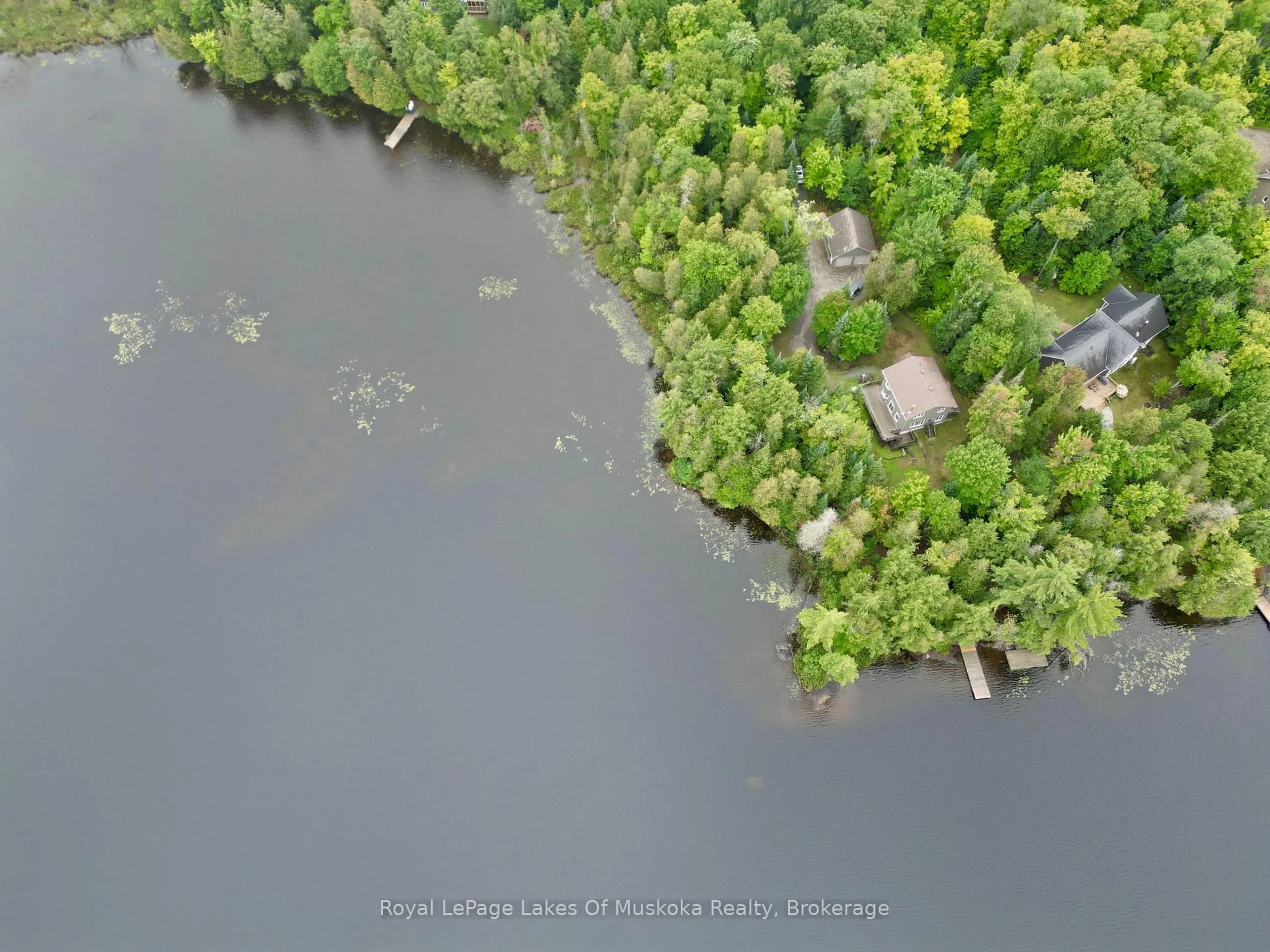 A pic from outside/outdoor area/front of a property/back of a property/a pic from drone, water/lake/river/ocean view for 49 Wolf Tr #16, Perry Ontario P0A 1R0