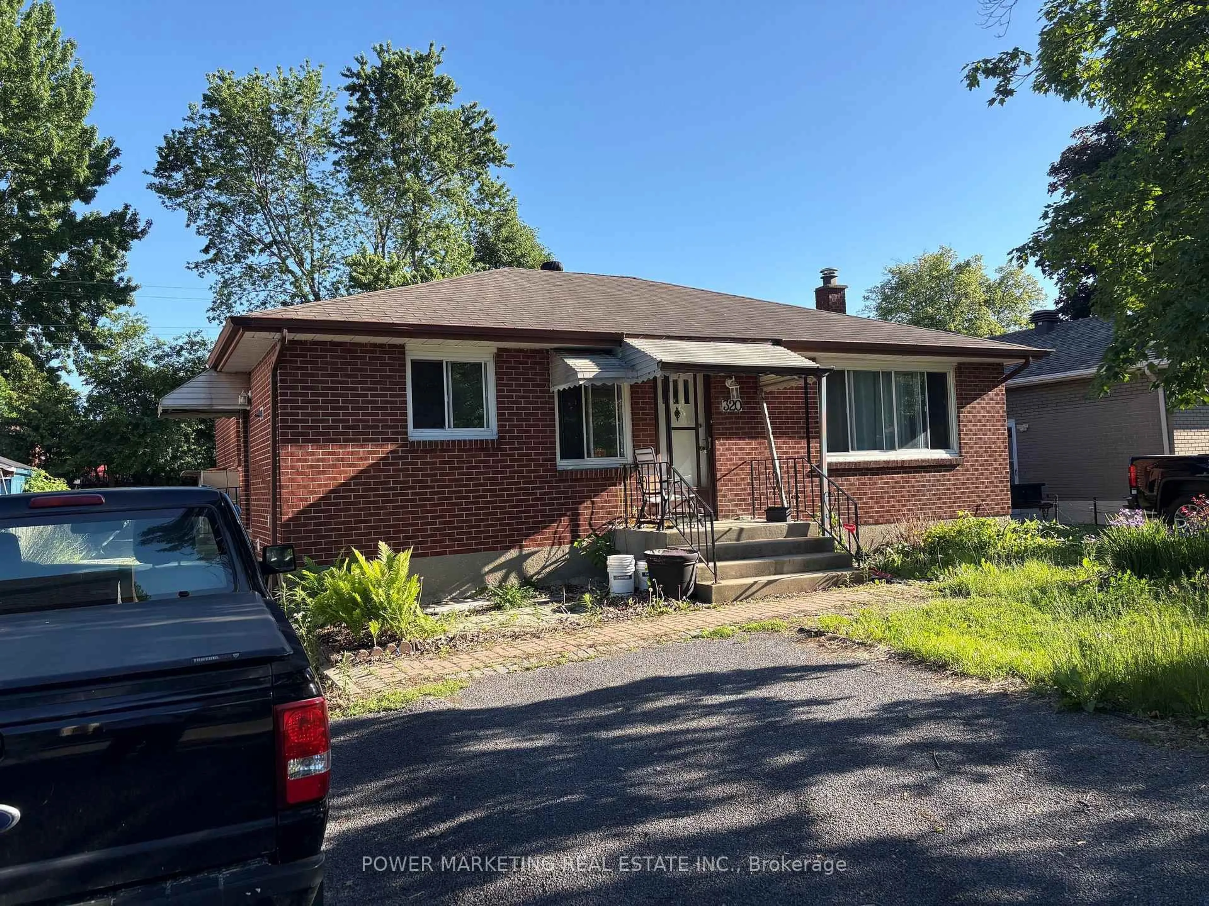 Home with brick exterior material, street for 320 Fullerton Ave, Ottawa Ontario K1K 1K3
