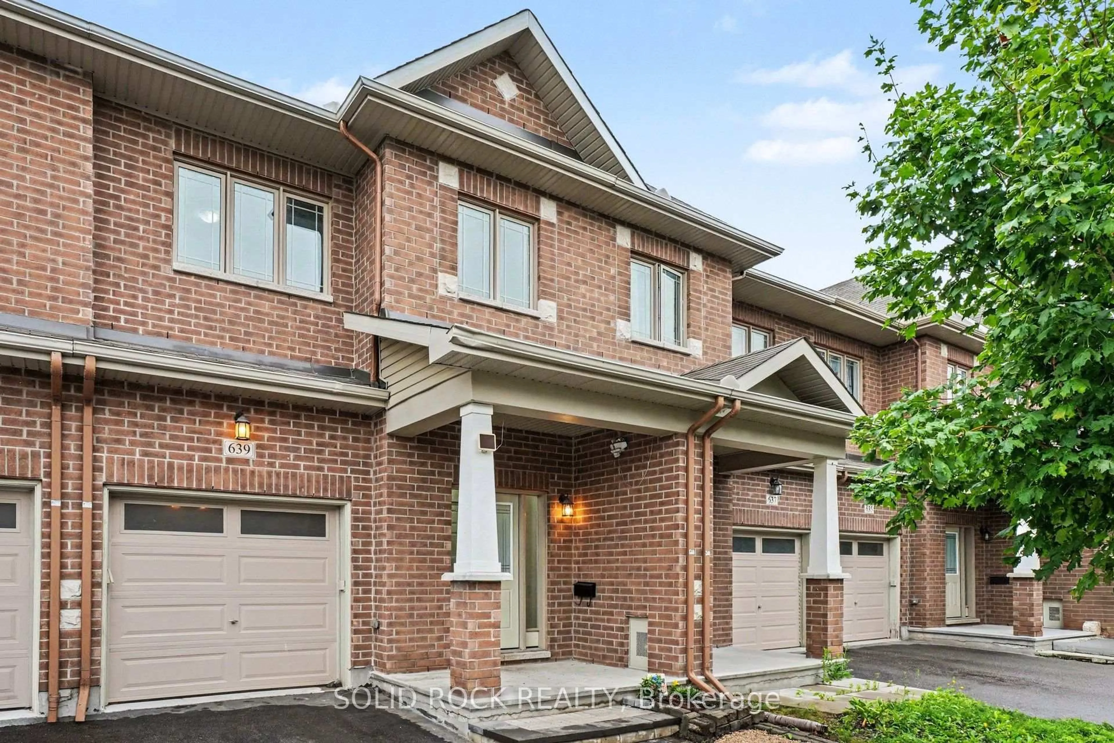 Home with brick exterior material, street for 639 Via Campanale Ave, Ottawa Ontario K2J 4A2