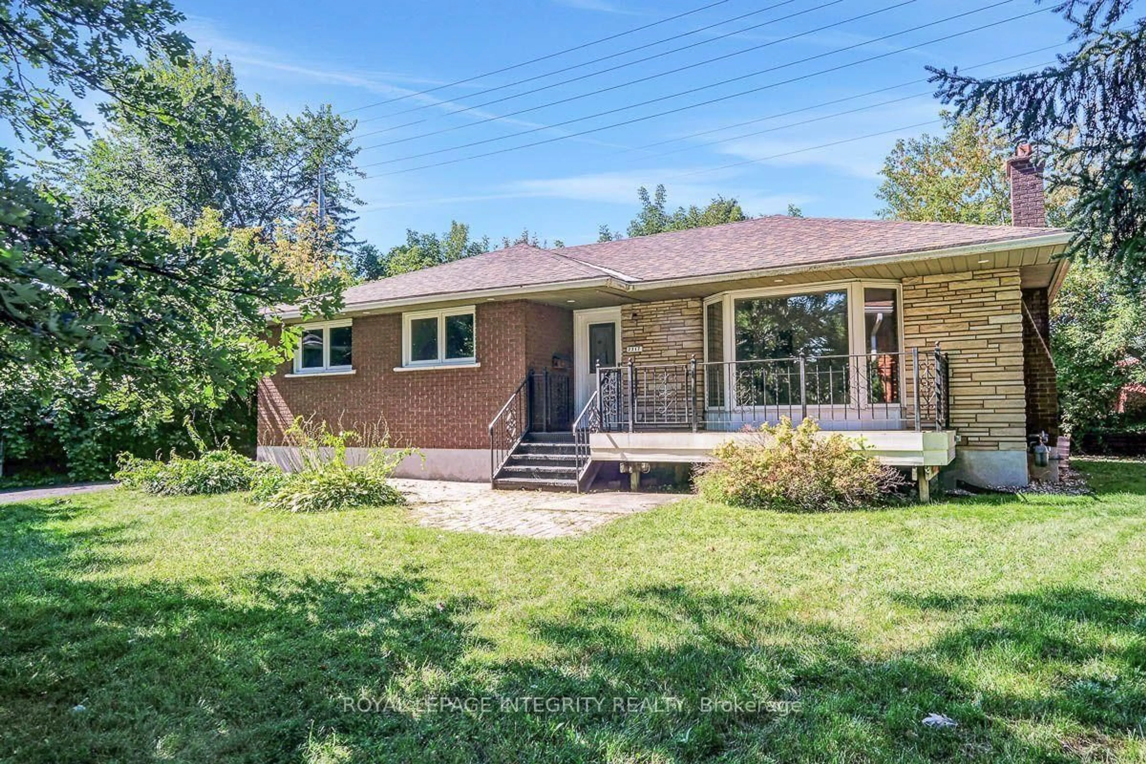Home with brick exterior material, street for 2317 Elmira Dr, Ottawa Ontario K2C 1H3