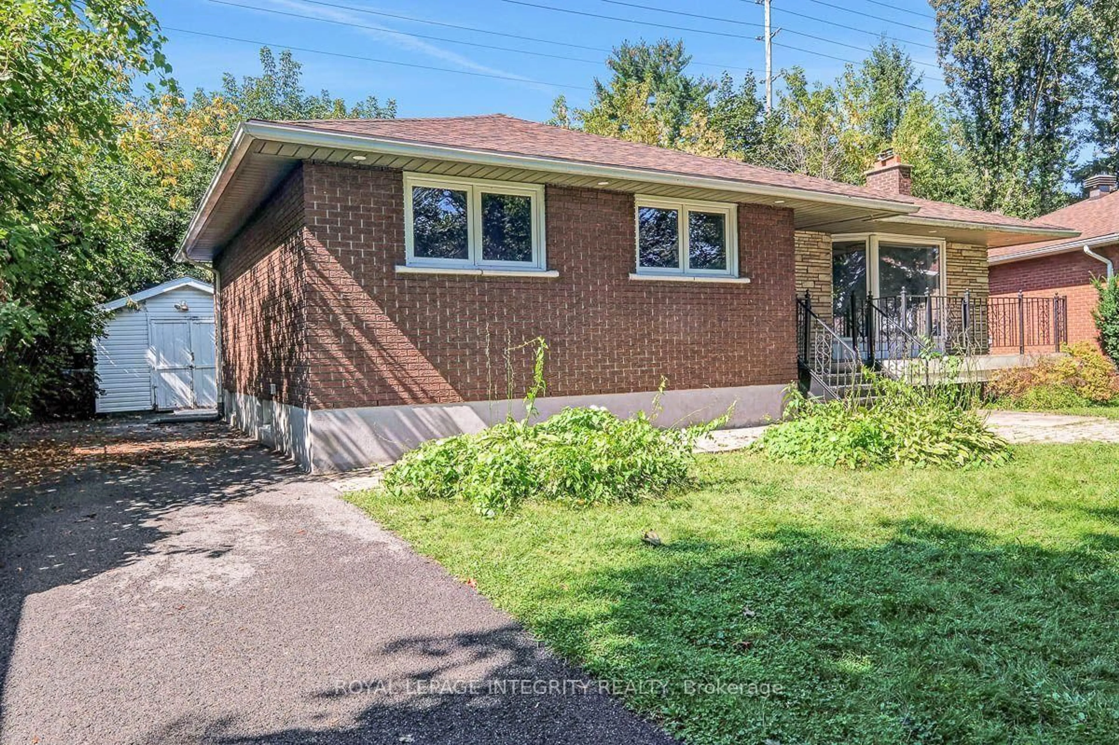 Home with brick exterior material, street for 2317 Elmira Dr, Ottawa Ontario K2C 1H3