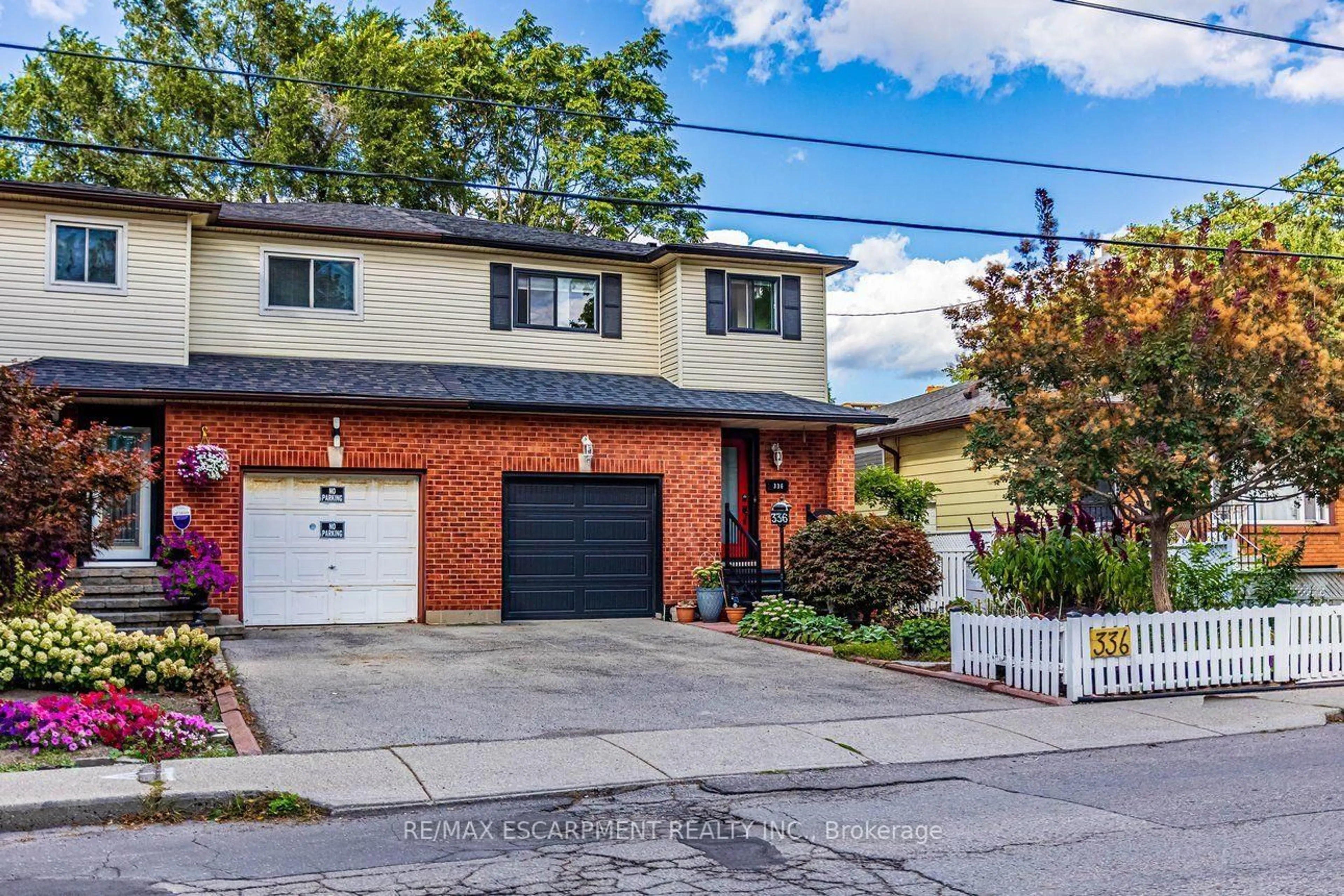 Home with brick exterior material, street for 336 Jackson St, Hamilton Ontario L8P 1M8