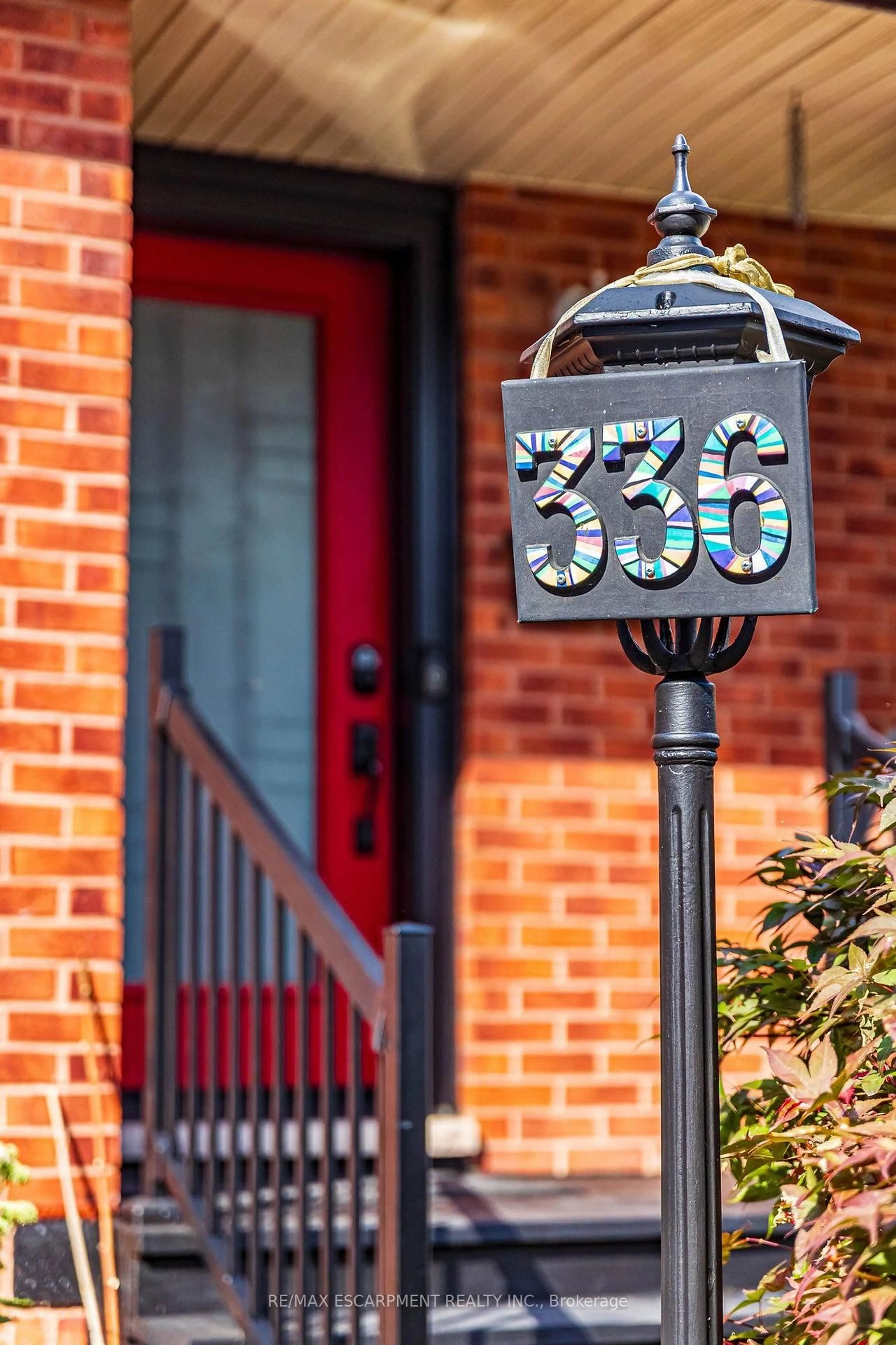 Home with brick exterior material, street for 336 Jackson St, Hamilton Ontario L8P 1M8
